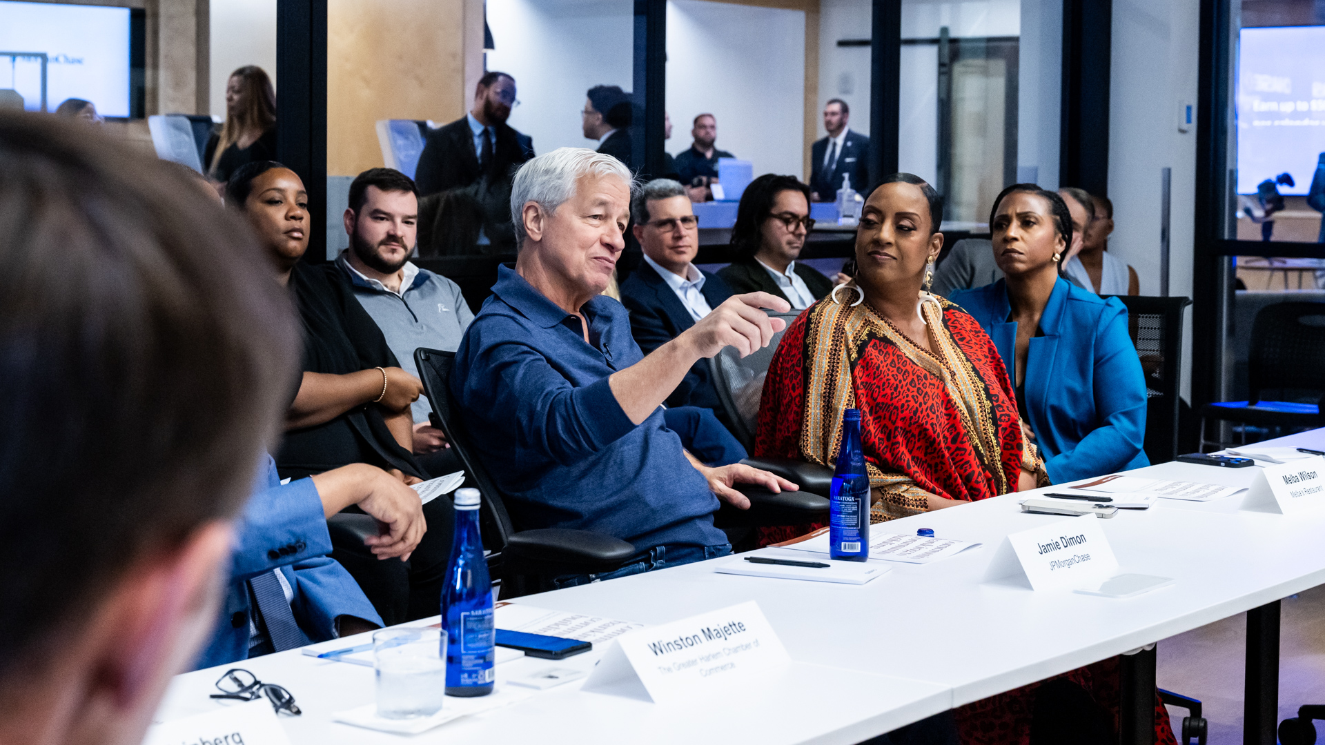 JPMorgan Chase CEO, Jamie Dimon speaks with Harlem restauranteur Melba Wilson and JPMorgan's national head of community and business development, Diedra Porché, at the fifth anniversary of the Harlem community center branch on October 3, 2024.