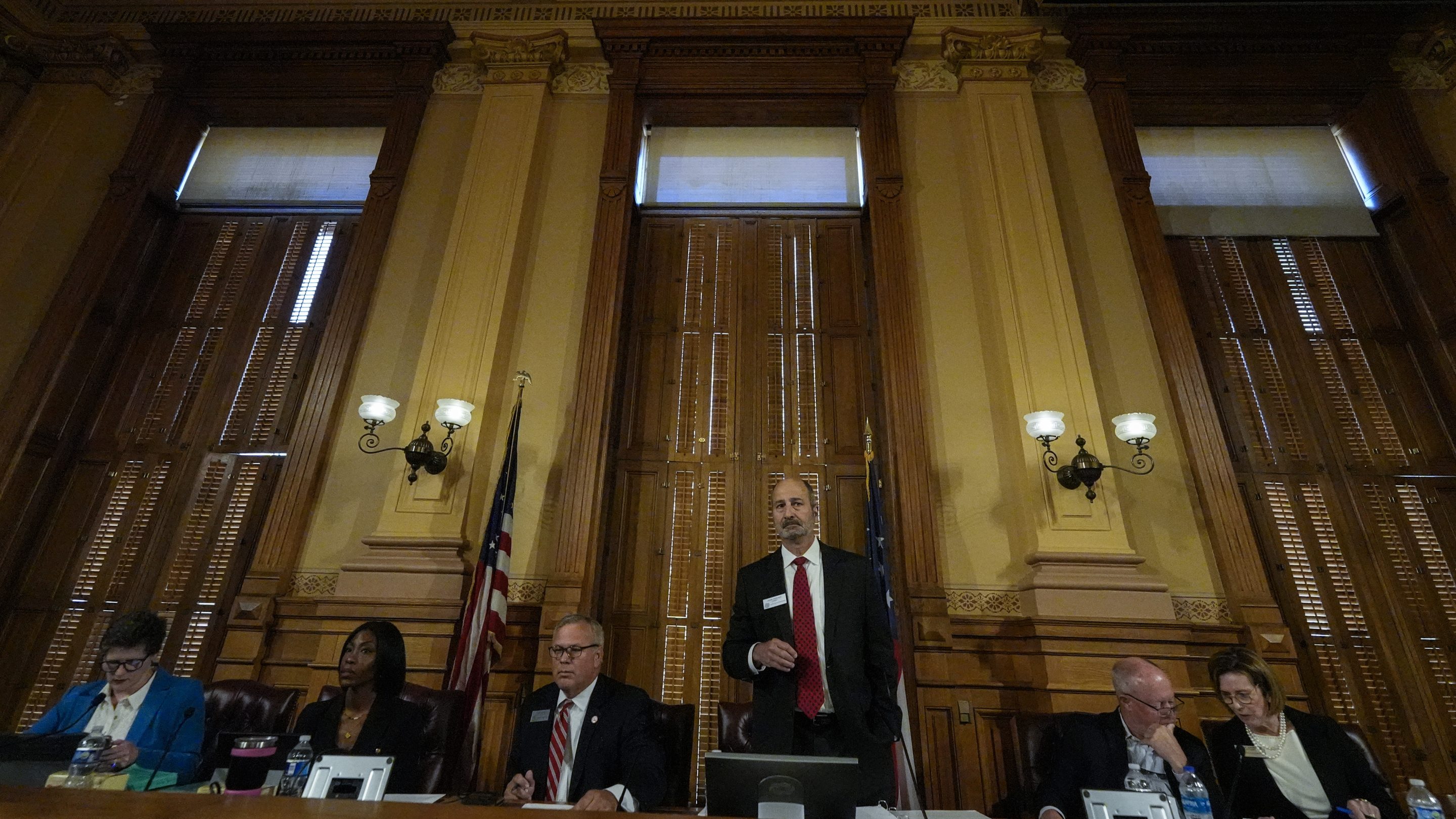 Georgia's State Election Board members discuss proposals for election rule changes at the state capitol, on Sept. 20, 2024, in Atlanta.