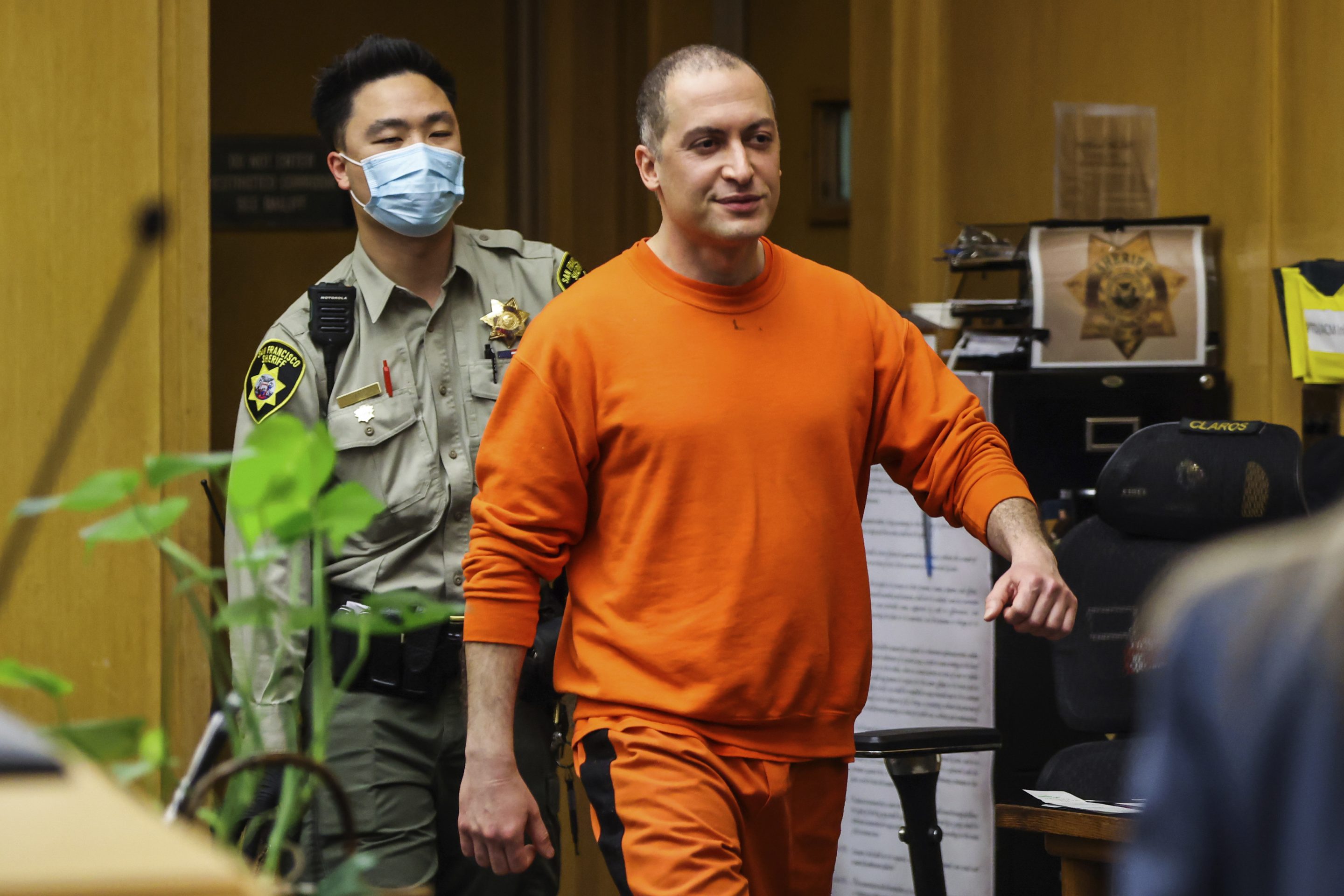 Nima Momeni, the man charged in the fatal stabbing of Cash App founder Bob Lee, makes his way into the courtroom for his arraignment in San Francisco, May 2, 2023.