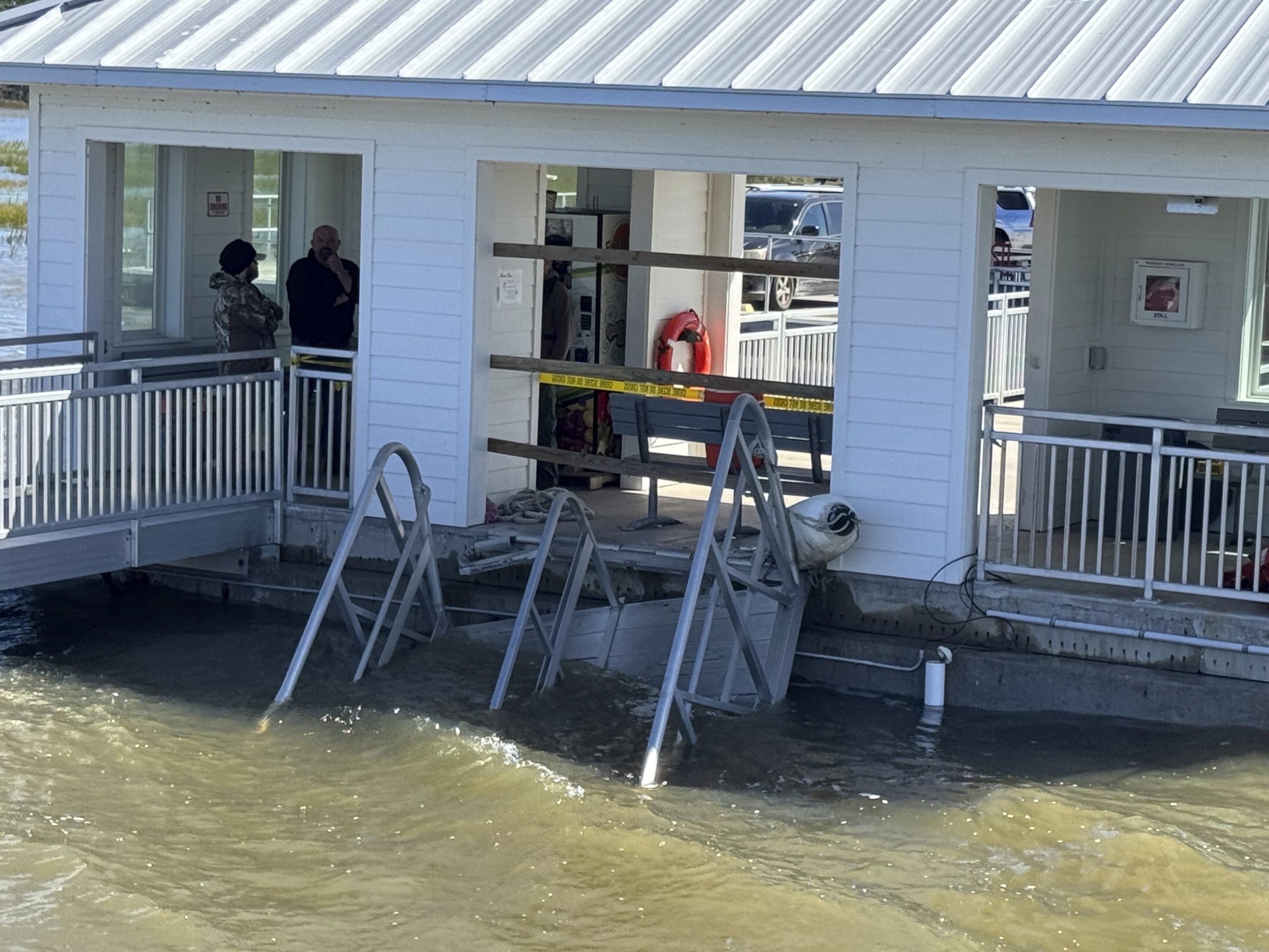 A portion of the gangway which collapsed Saturday afternoon remains visible on Sapelo Island in McIntosh county, Ga., Oct. 20, 2024.