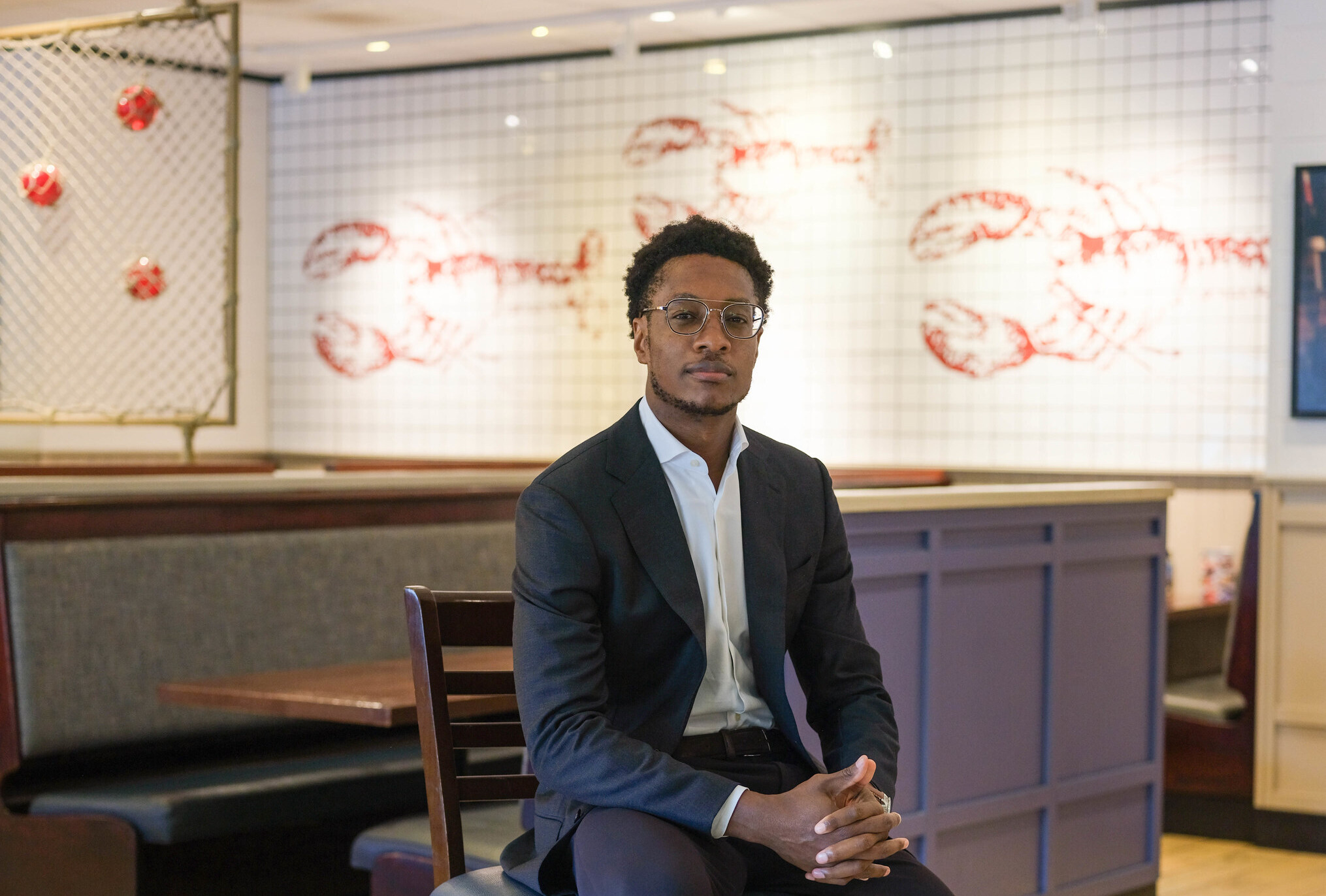 Red Lobster CEO sitting in restaurant