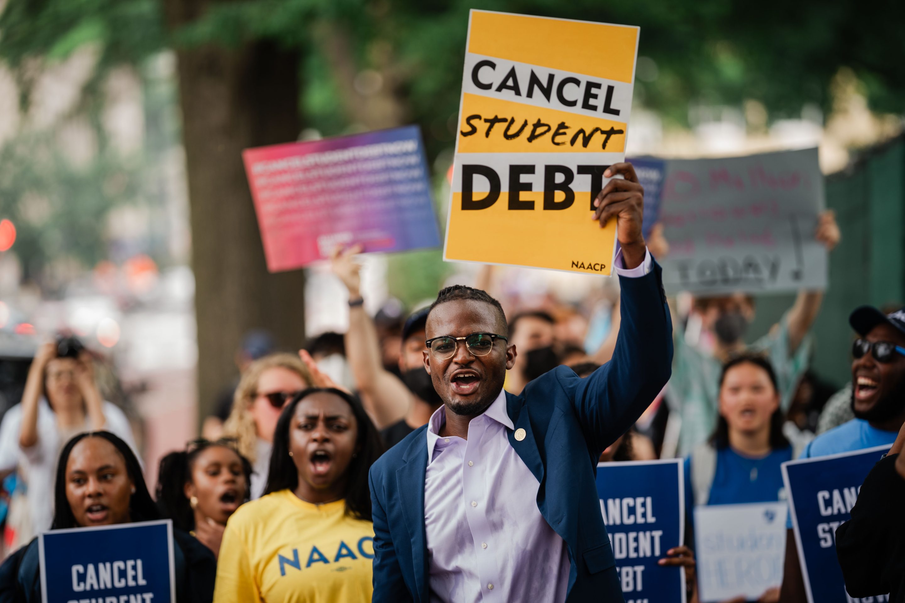 Wisdom Cole, the National Director of the NAACP Youth and College Division leads a march from the Supreme Court of the United States.