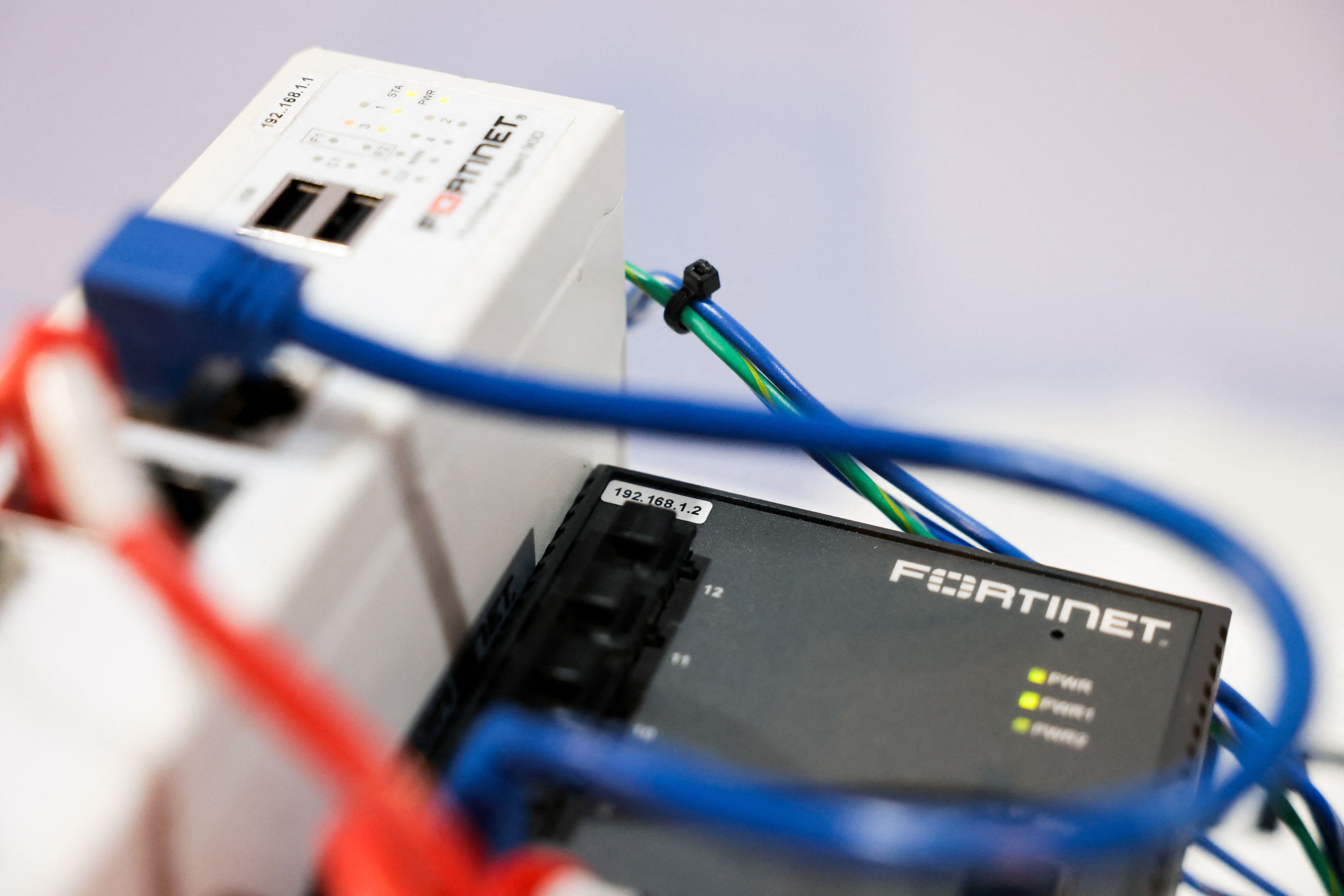 A device designed to detect hacks manufactured by cybersecurity firm Fortinet is seen on display during the company's Informational Security Carnival in Taipei on November 23, 2023. After 20 years of slow growth the firm has found its footing post-Covid quarantine.