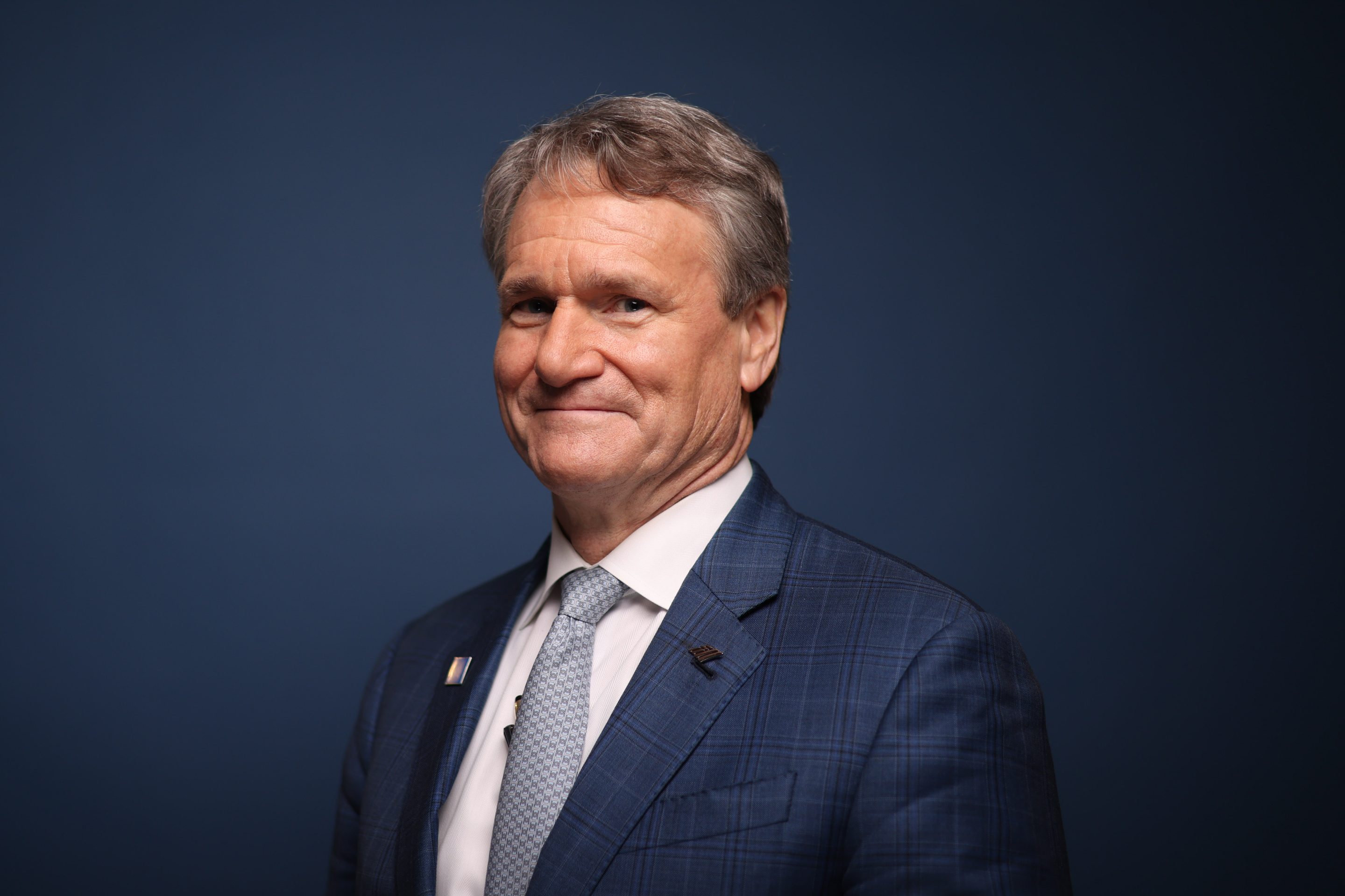 Brian Moynihan smiles at camera.