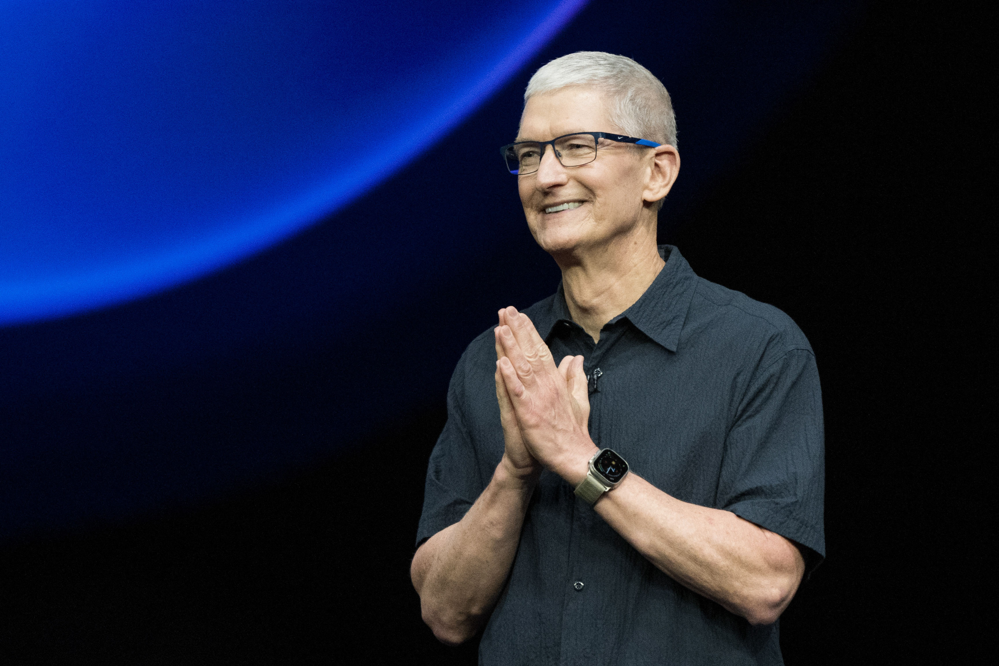 Apple CEO Tim Cook speaking onstage