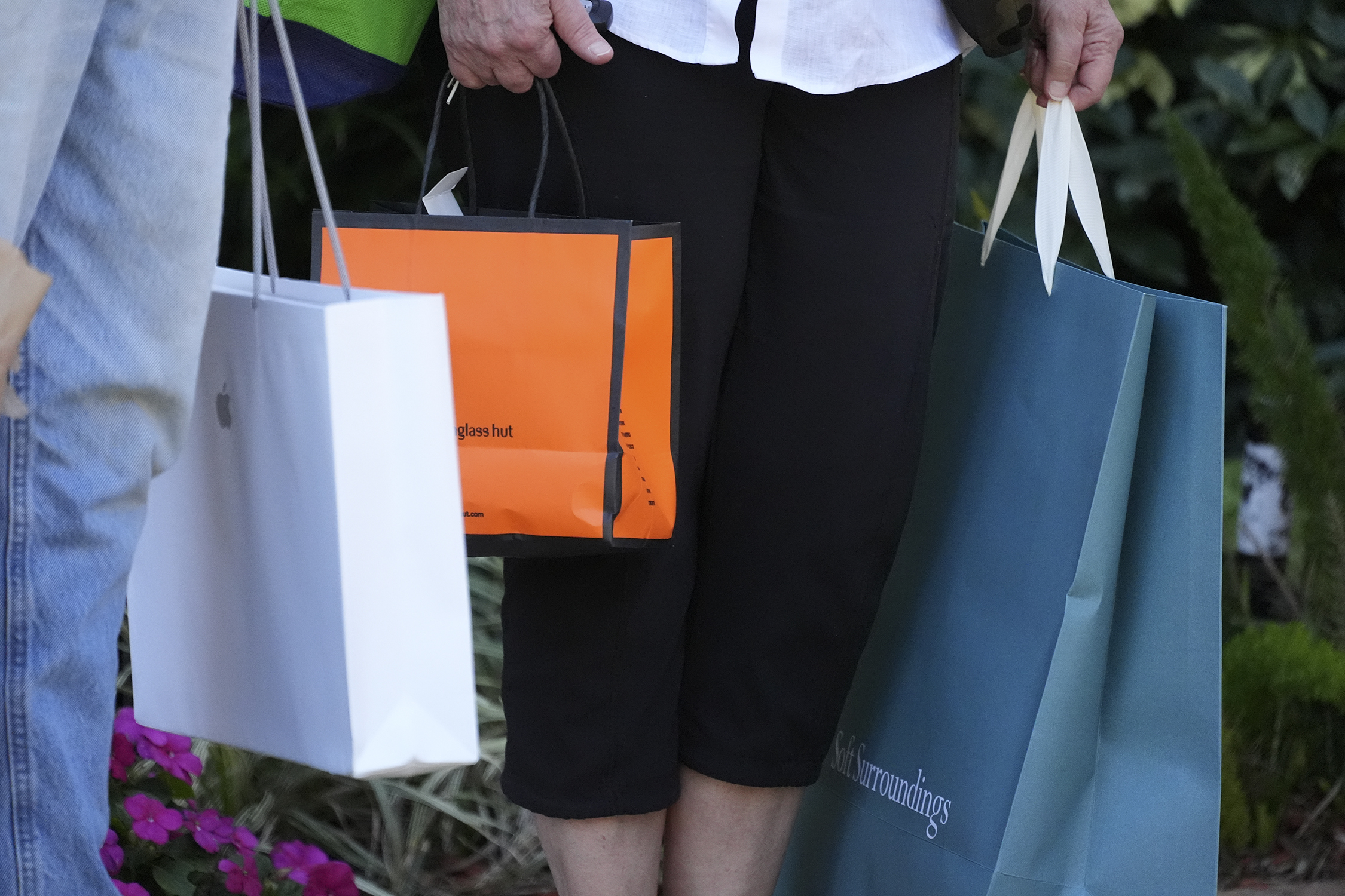 A woman holding shopping bags