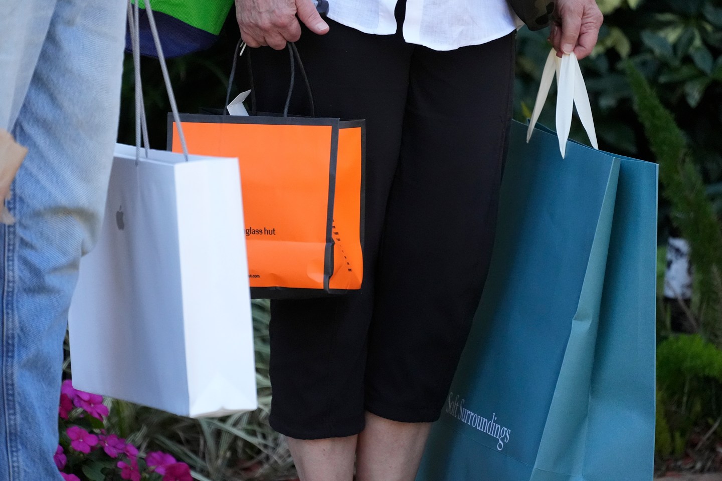 A woman holding shopping bags