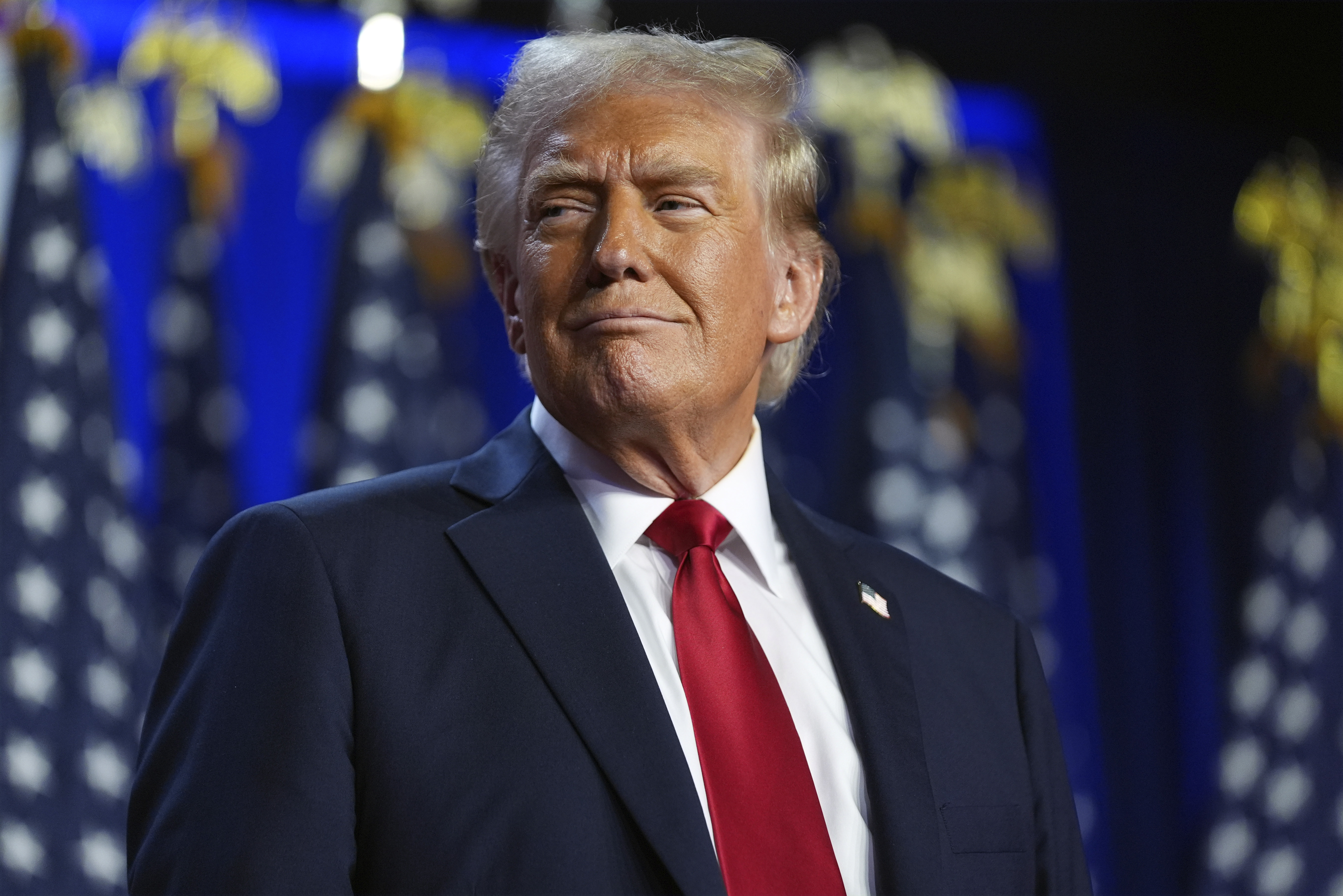 Republican presidential nominee former President Donald Trump arrives at an election night watch party at the Palm Beach Convention Center, on Nov. 6, 2024, in West Palm Beach, Fla.