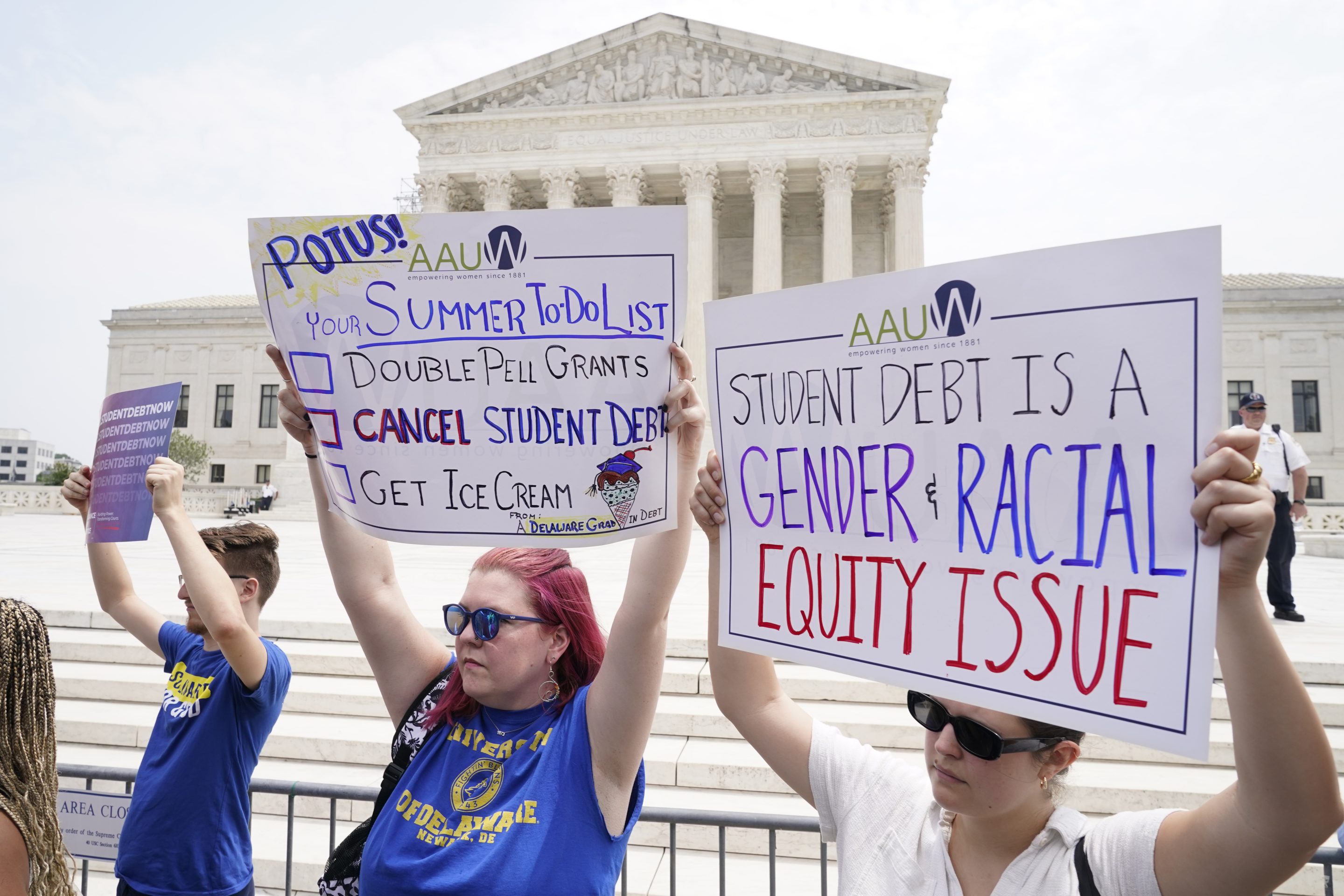 People demonstrate outside the Supreme Court, June 30, 2023, in Washington.