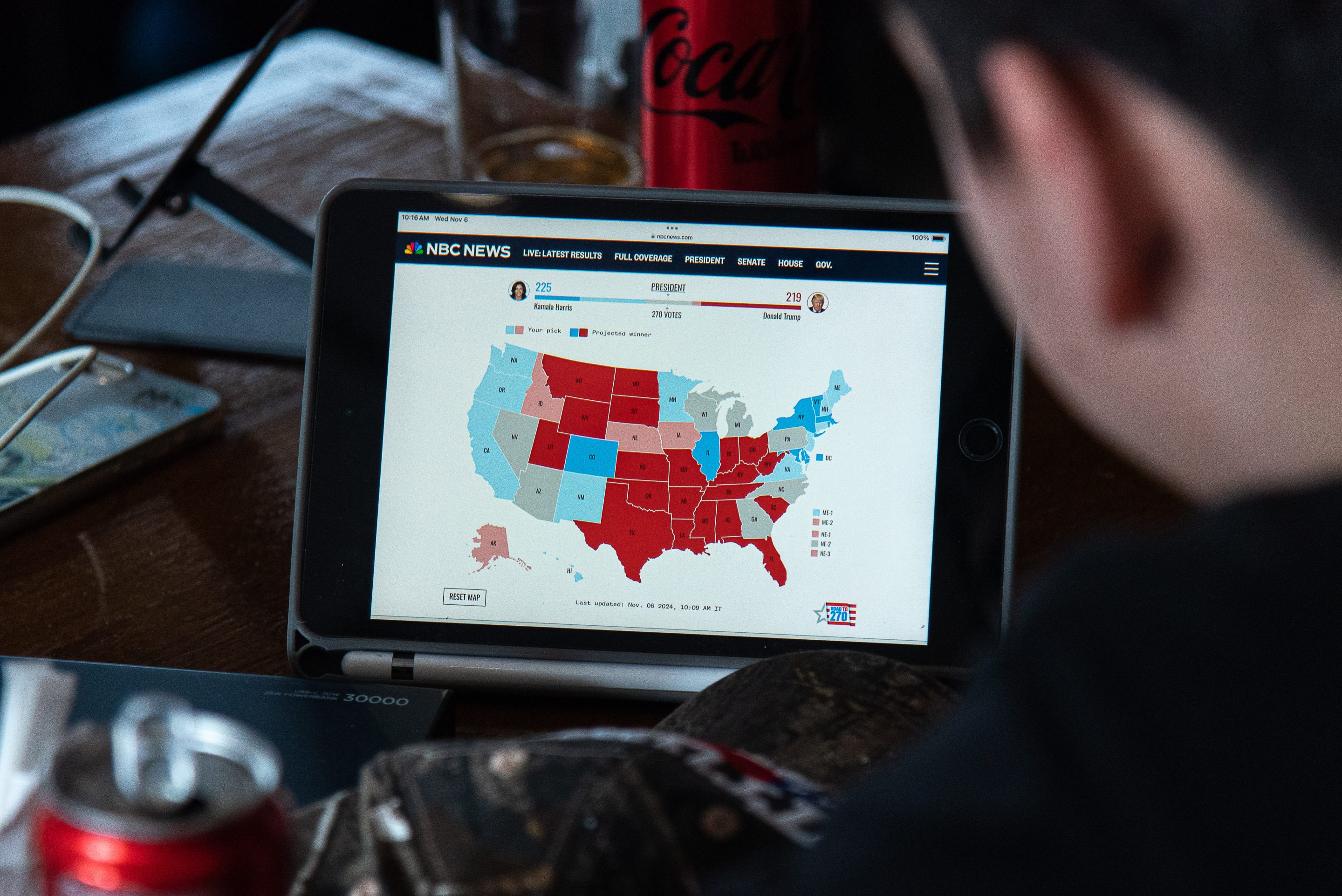 A man seen watching the broadcasting of the U.S. election results at the restaurant in Bangkok.