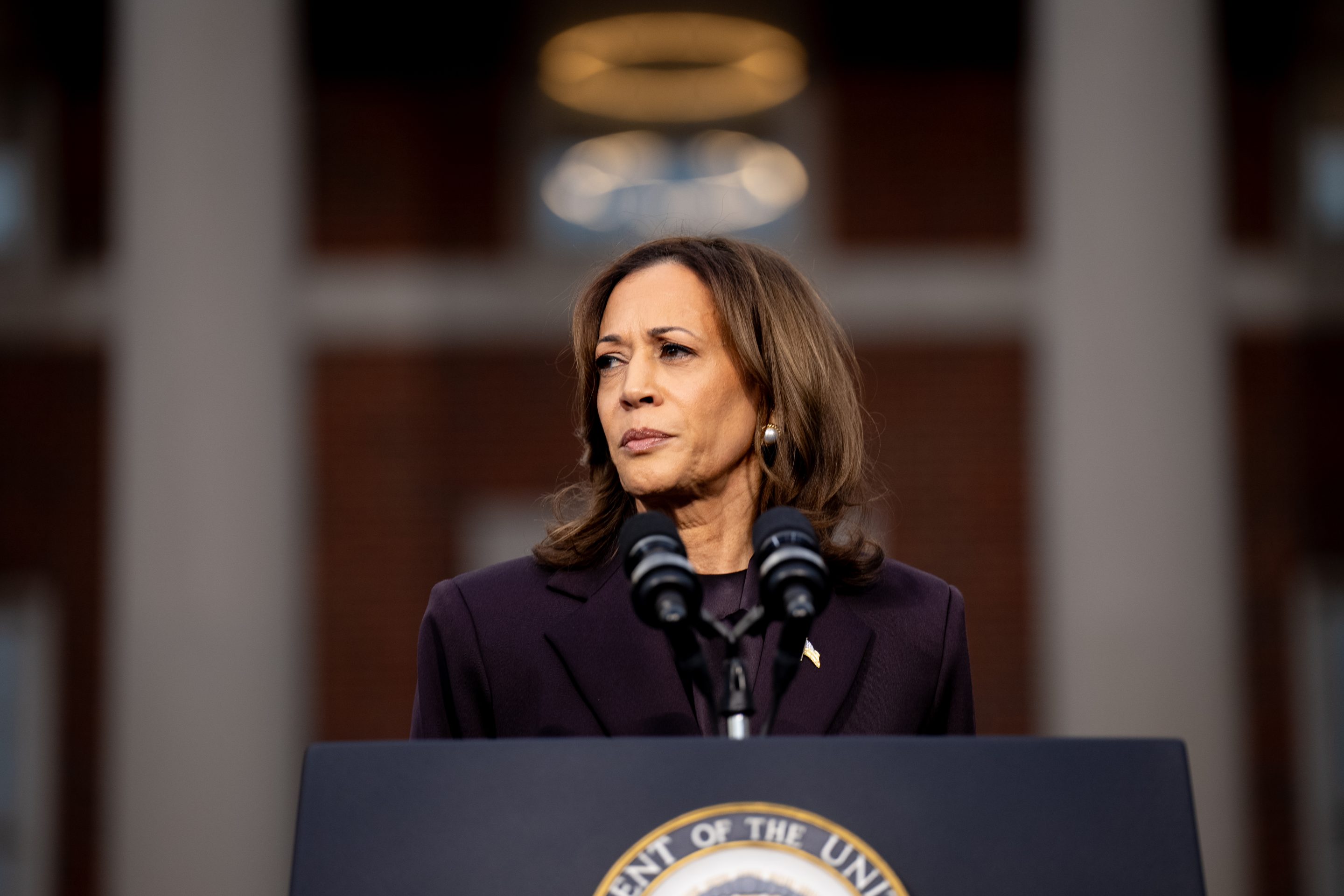U.S. Vice President Kamala Harris standing behind a podium