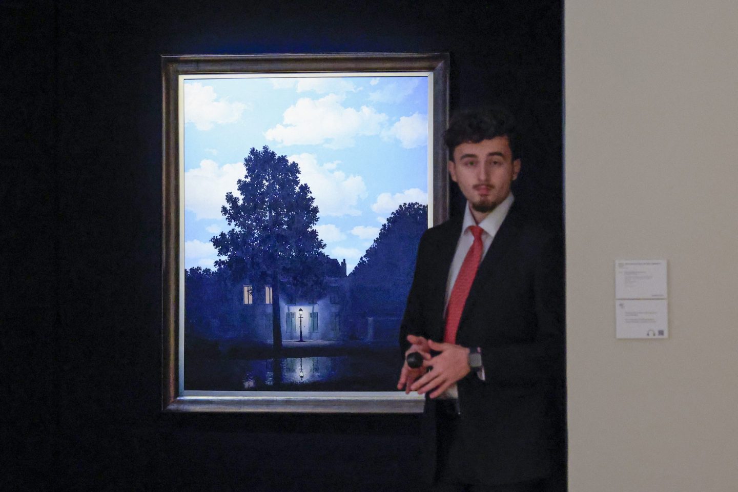 Rene Magritte painting ‘Empire of Light’ nets auction record of $121 million at Christie’s in New York