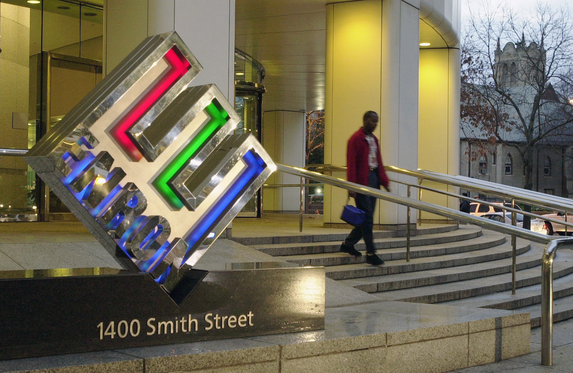 An unidentified person leaves Enron Corp.