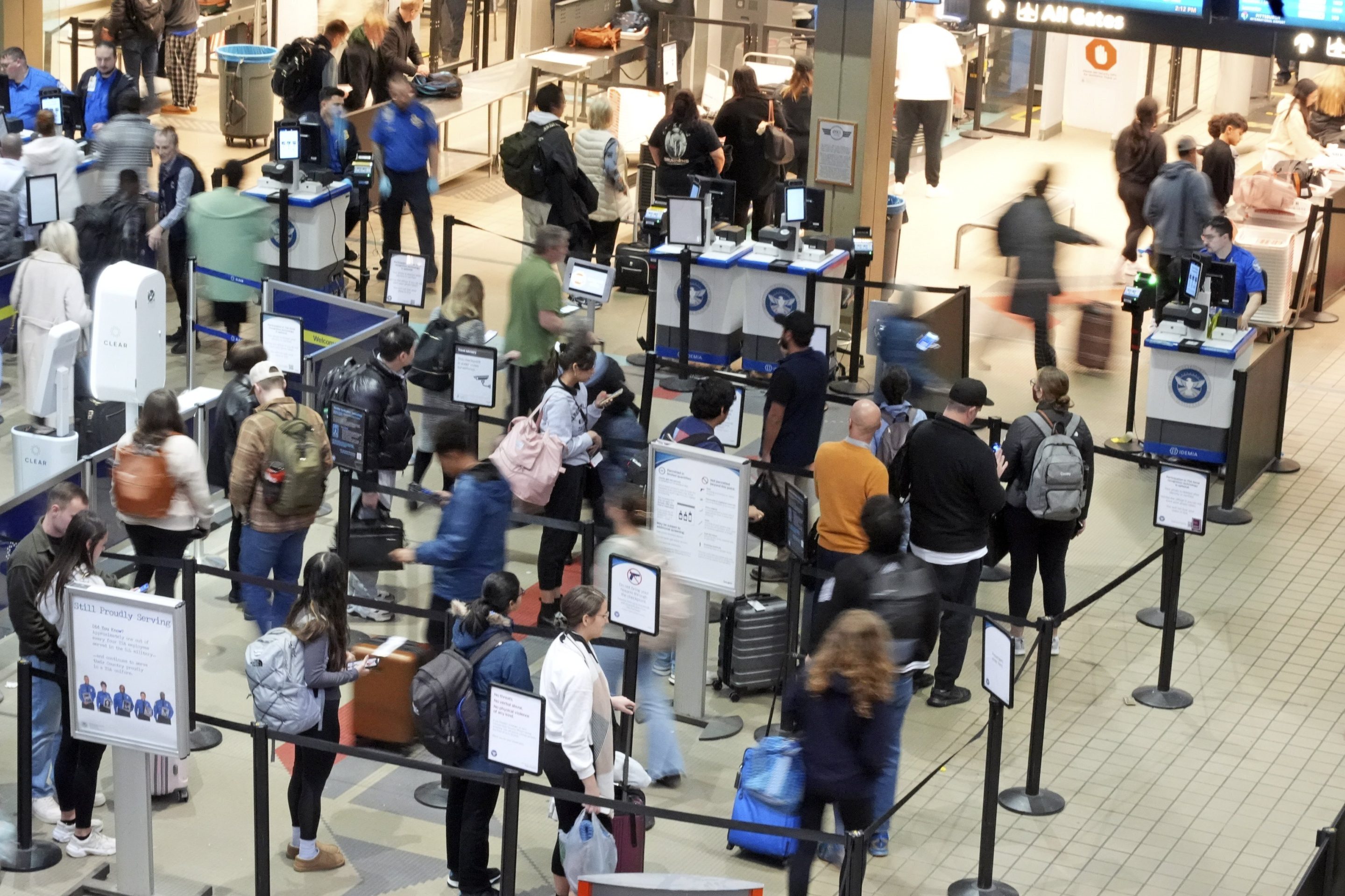 Passengers line up at the security checkpoint in Pittsburgh International Airport on Dec. 11, 2024.