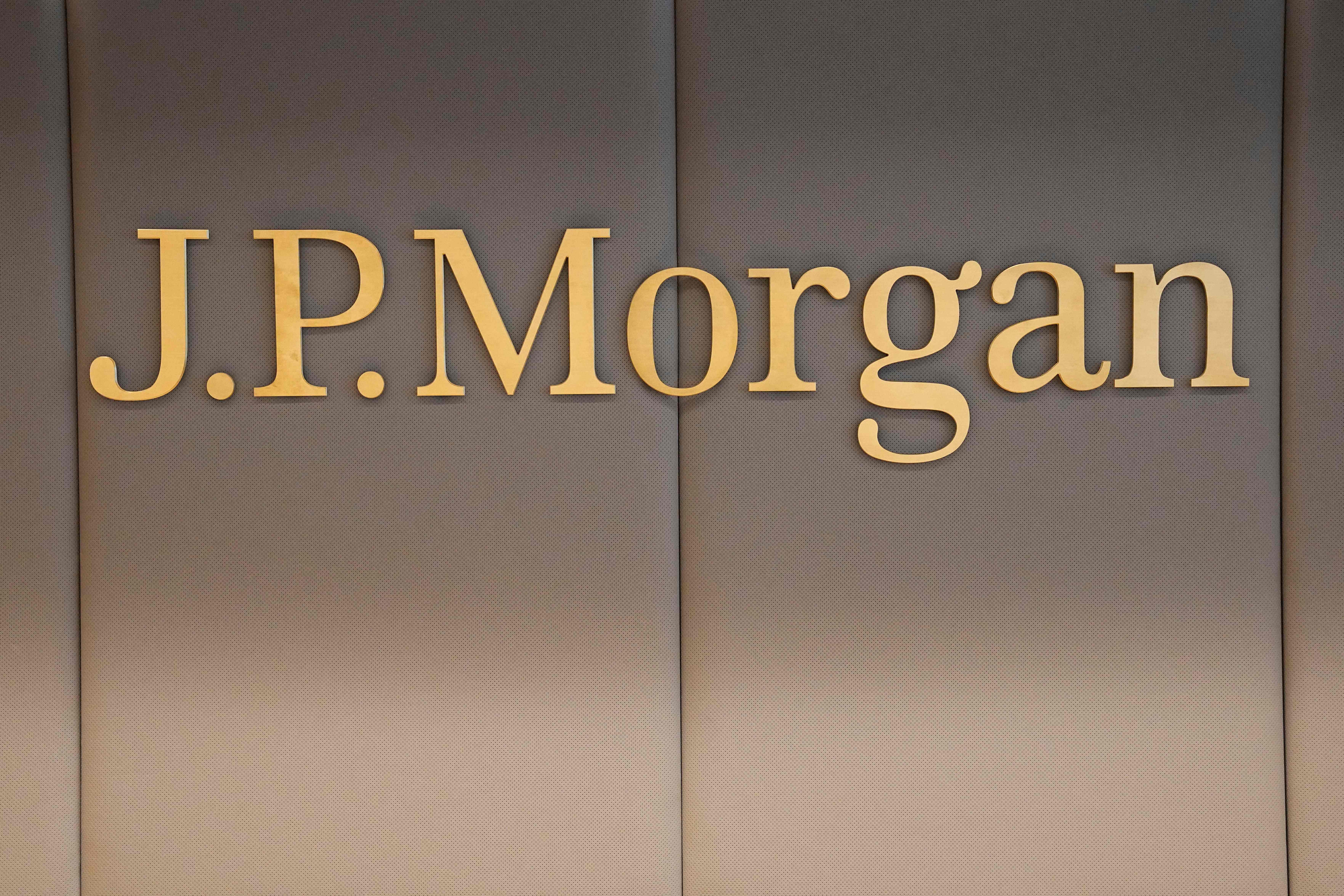 The logo of JP Morgan bank is pictured at the new French headquarters of the bank on June 29, 2021 in Paris. The CEO of JPMorgan Chase's consumer & community banking division sounded optimistic in a talk at the Conrad Hotel in New York, but reserved some worries about three bank regulations.