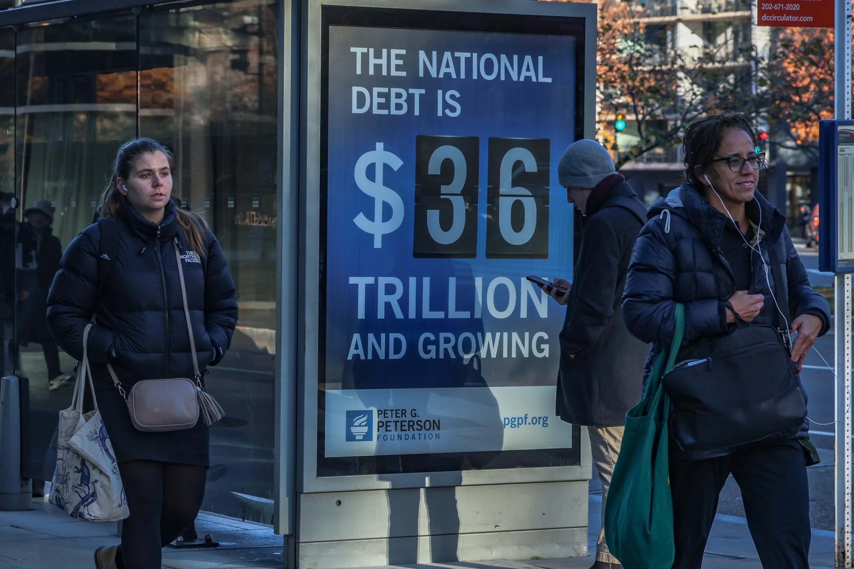 A poster showing the national debt in Washington, DC.