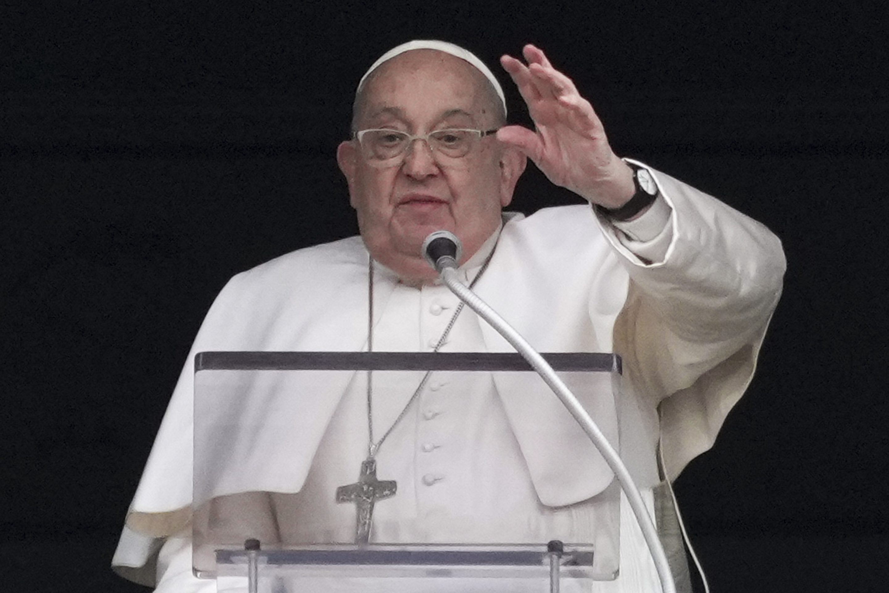 Pope Francis delivers his blessing as he recites the Angelus noon prayer from the window of his studio overlooking St.Peter's Square, at the Vatican, on Jan. 19, 2025.