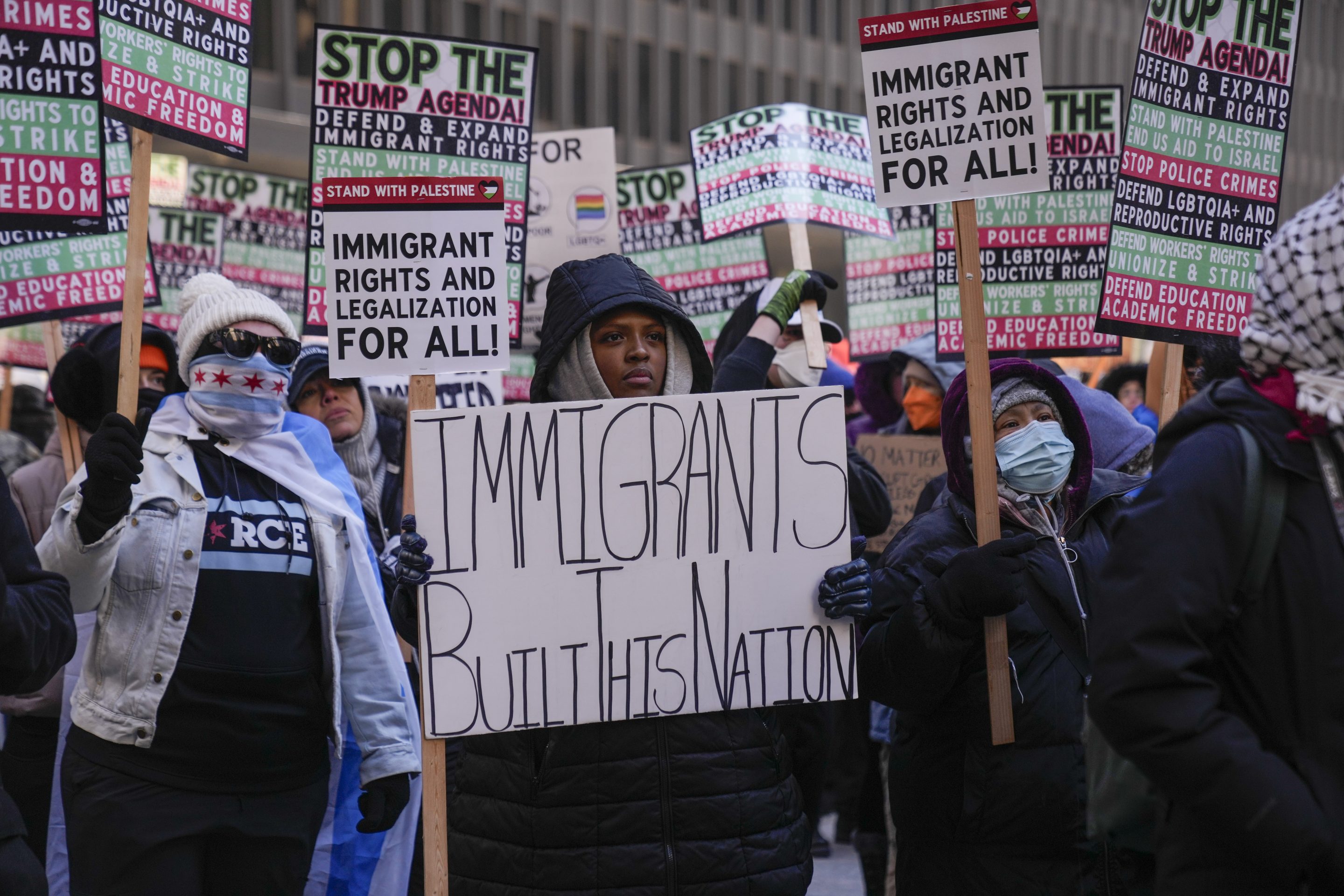 Sonia Rosa Sifore and other anti-Trump protesters gather in Federal Plaza to rally for a number of issues, including immigrant rights, the Israel-Hamas war, women's reproductive rights, racial equality and others, on the day of President Trump's Inauguration, on Jan. 20, 2025, in Chicago.