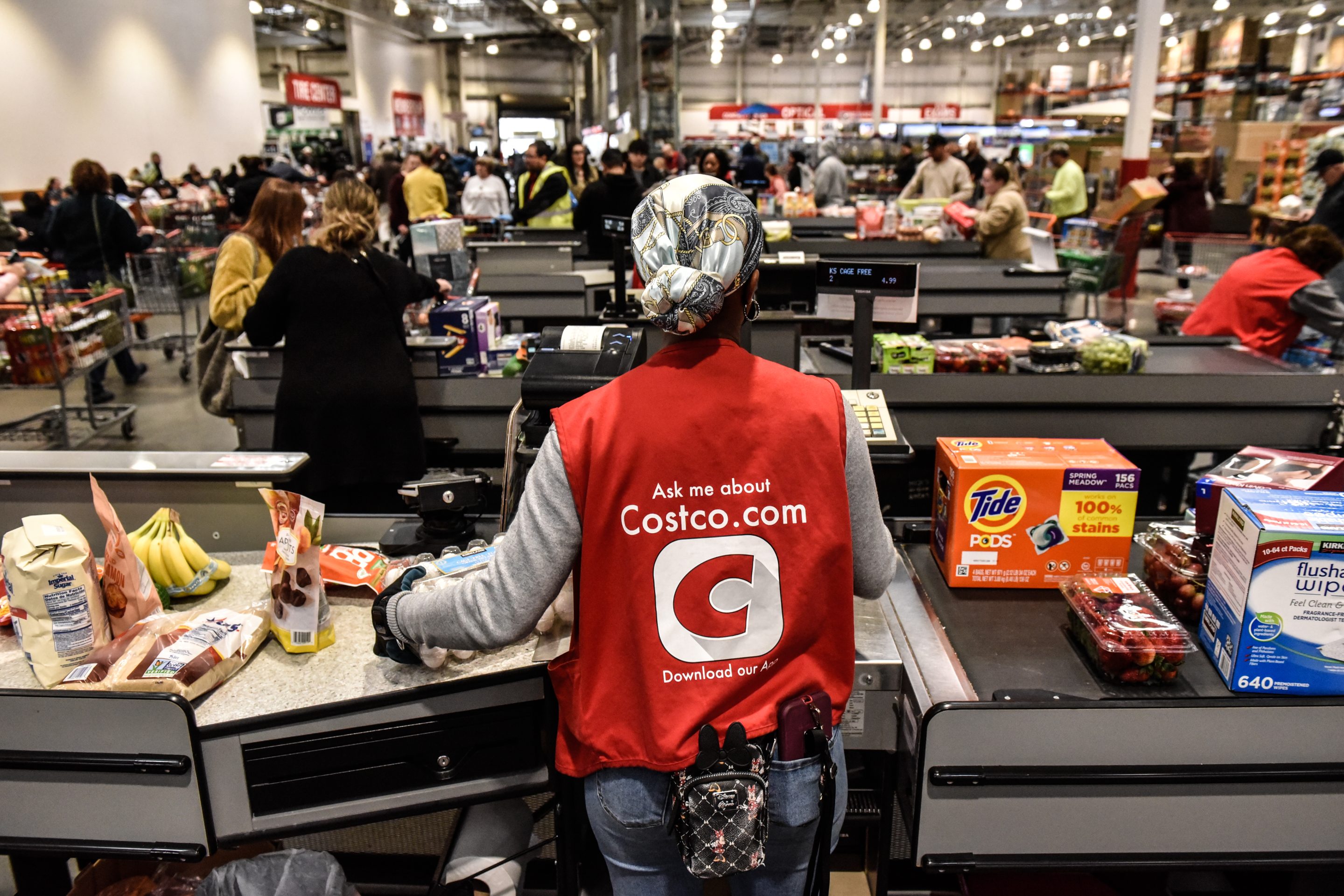 Costco worker at check-out line