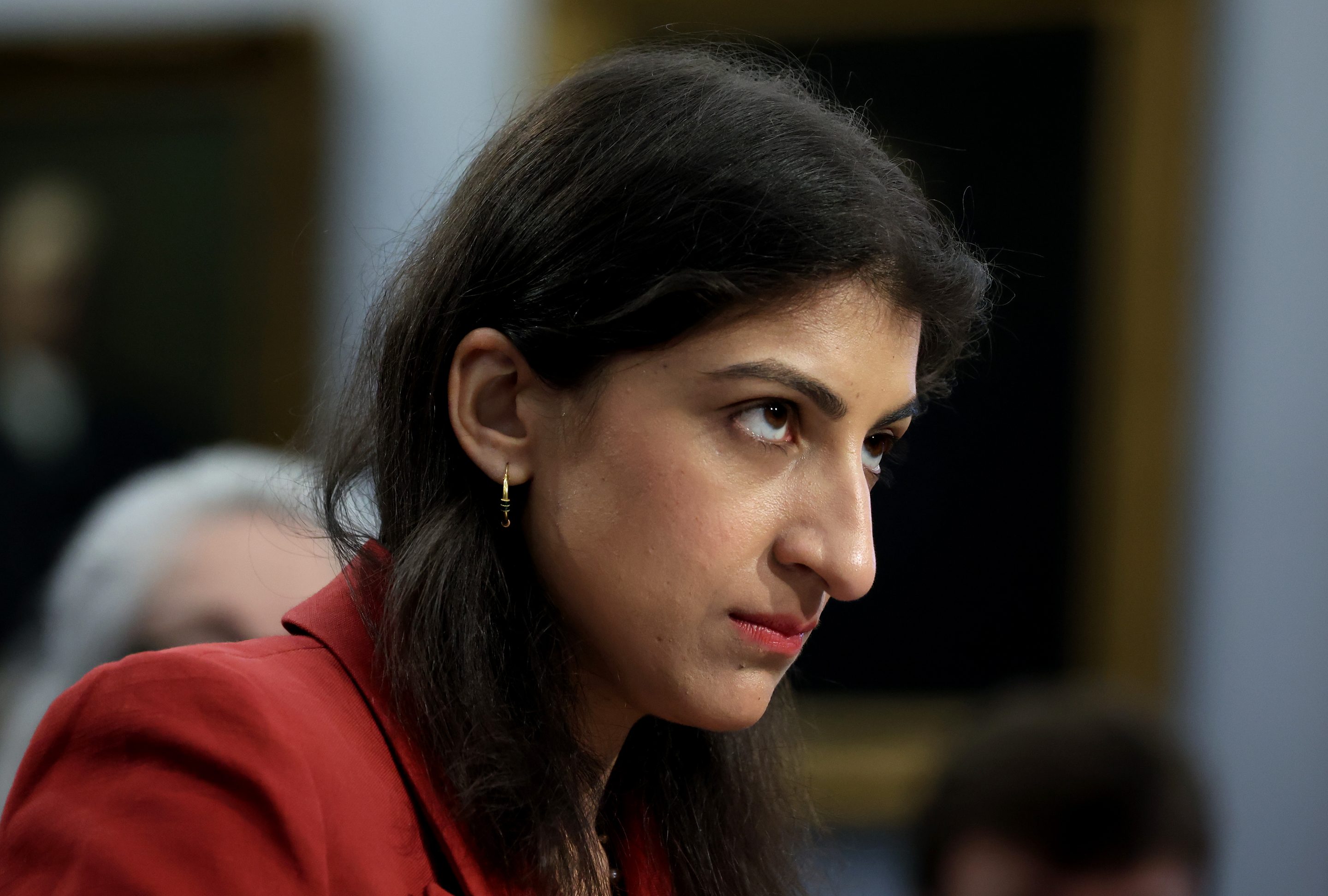 Lina Khan with a stern look on her face