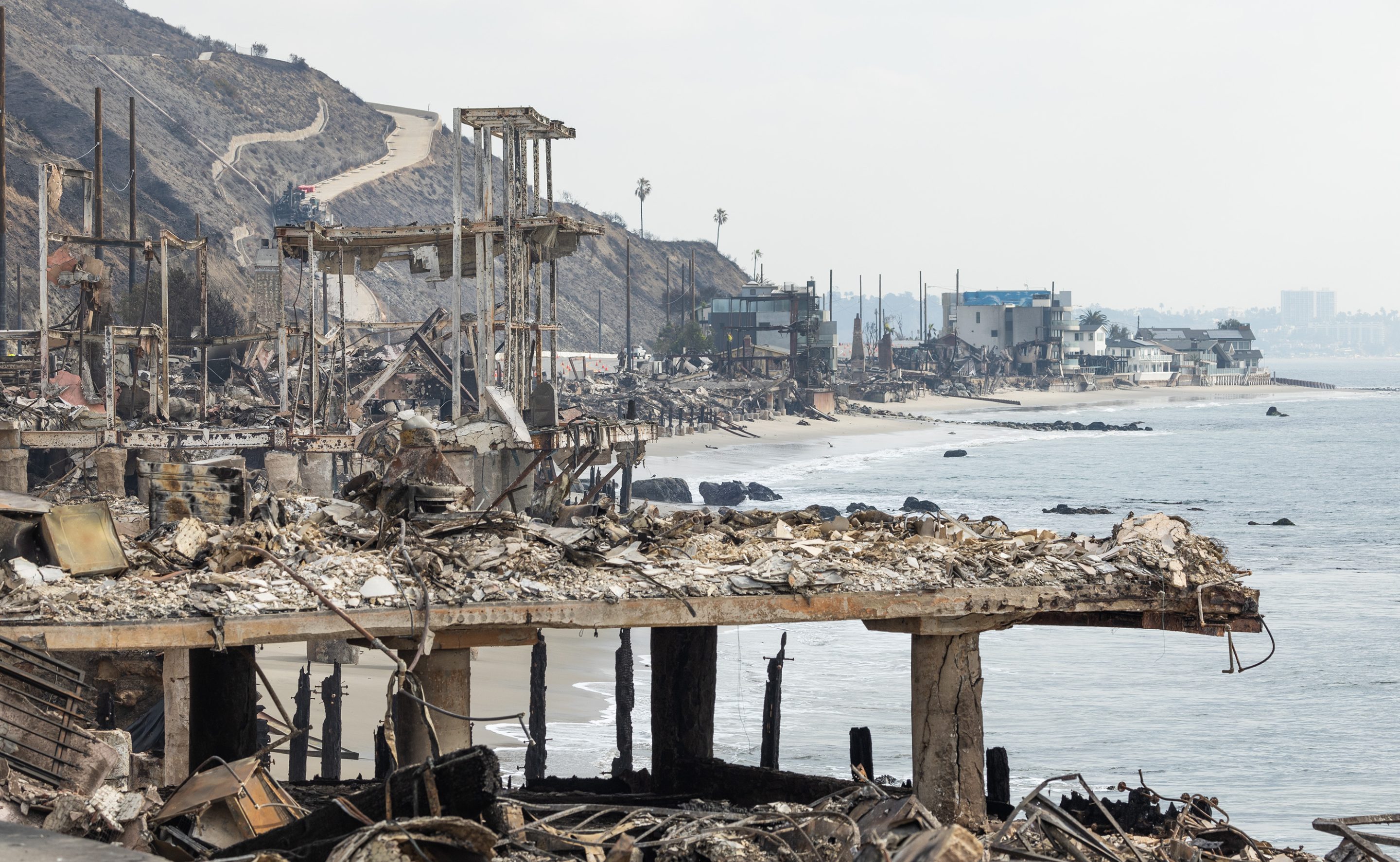 Oceanfront homes destroyed by the Palisades fire on Pacific Coast Highway in Malibu on Saturday.