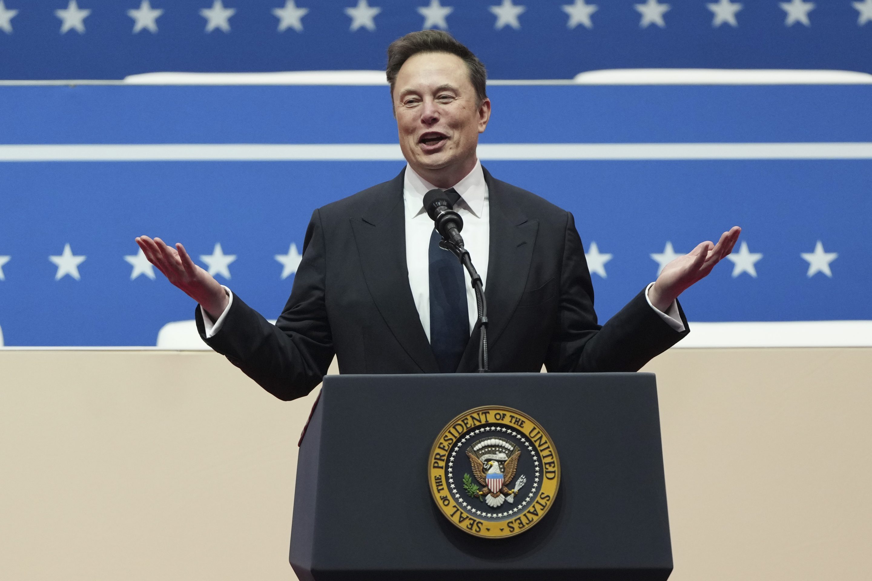 Elon Musk speaks at an indoor Presidential Inauguration parade event in Washington, Jan. 20, 2025.