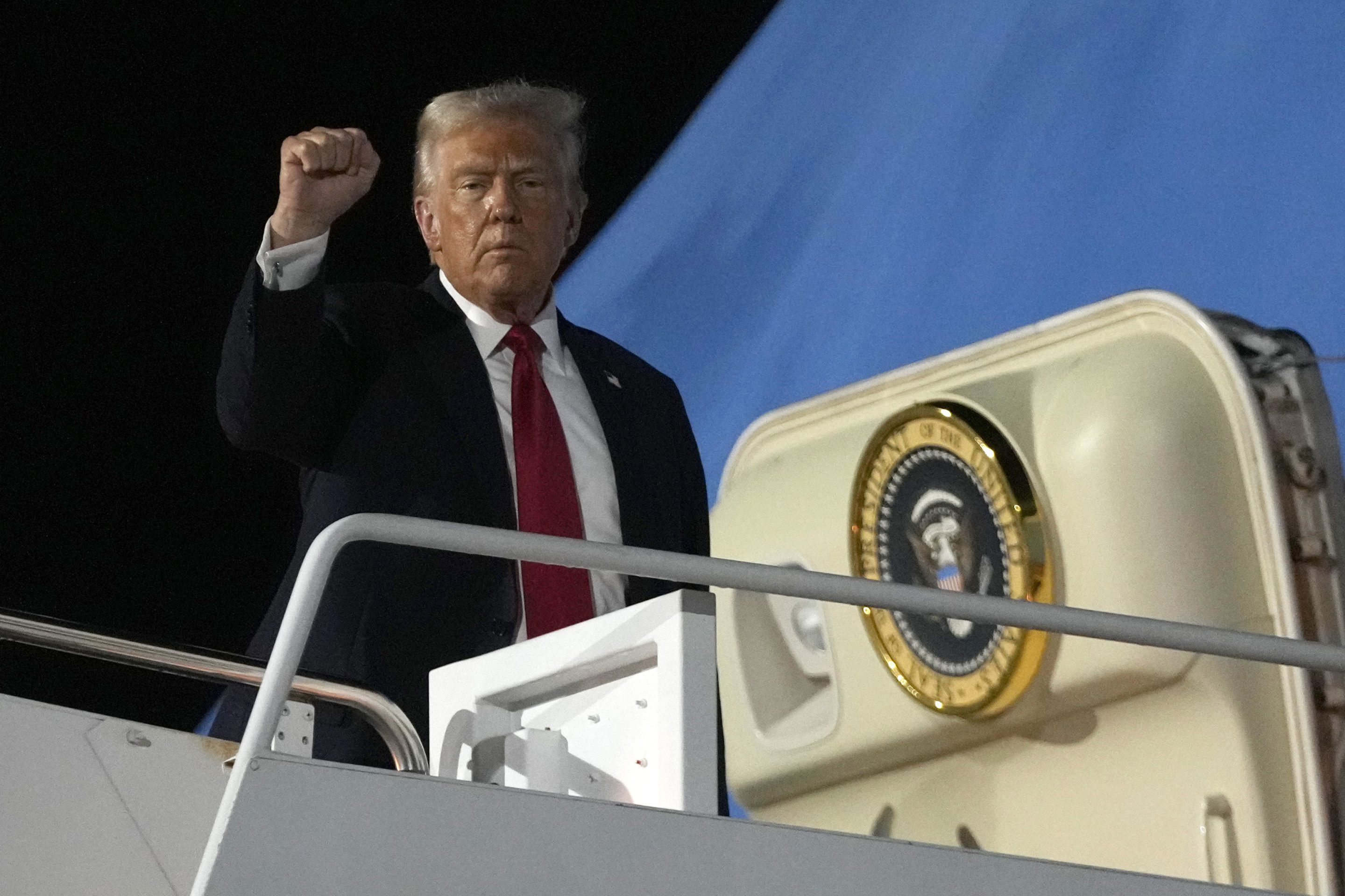 President Donald Trump boards Air Force One at the Naval Air Station Joint Reserve Base in New Orleans, on Feb. 9, 2025.