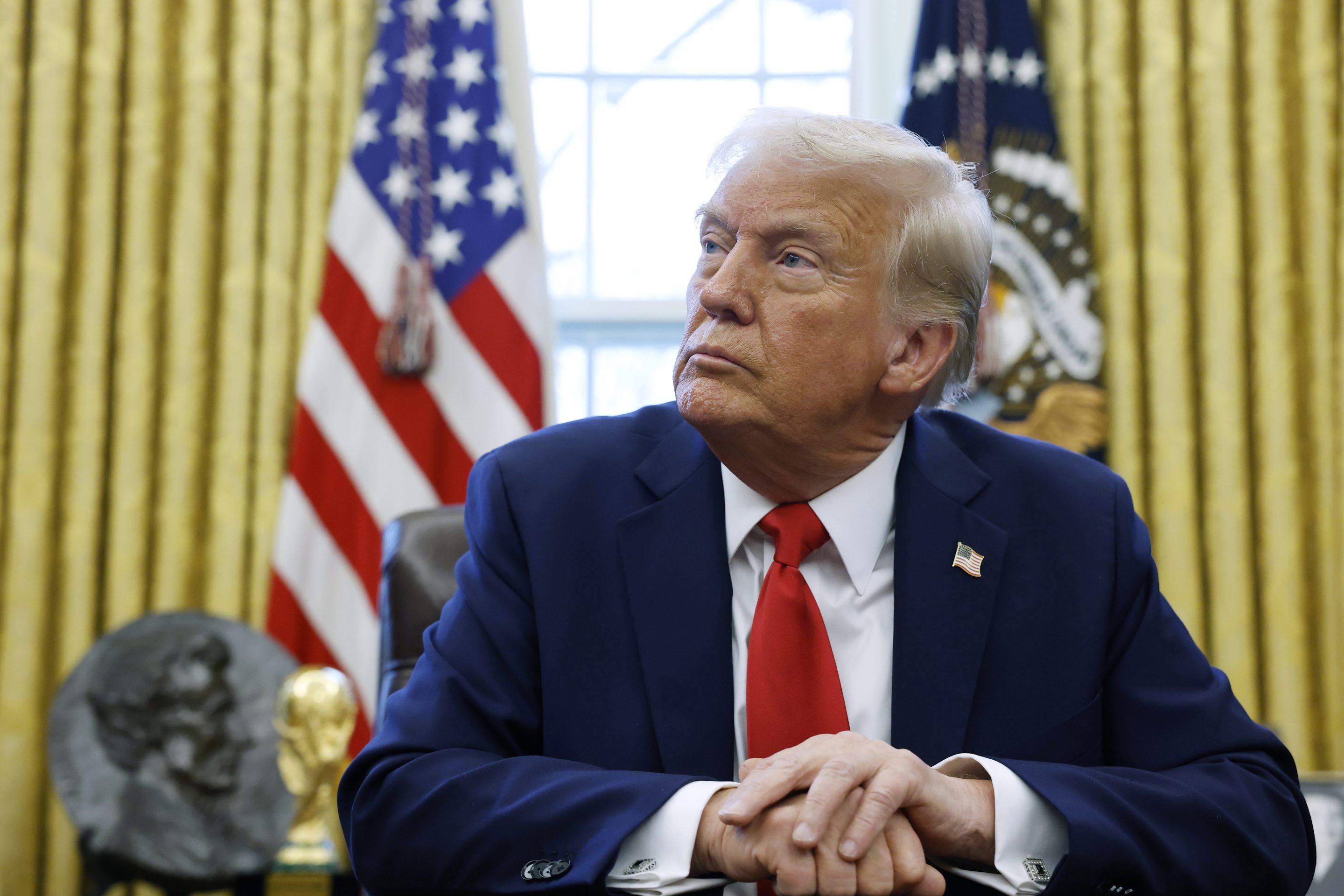 President Donald Trump speaks to reporters in the Oval Office on Monday.