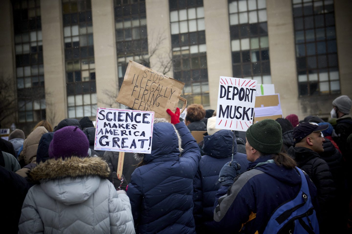 Former federal workers protest against the Department of Government Efficiency helmed by Elon Musk.