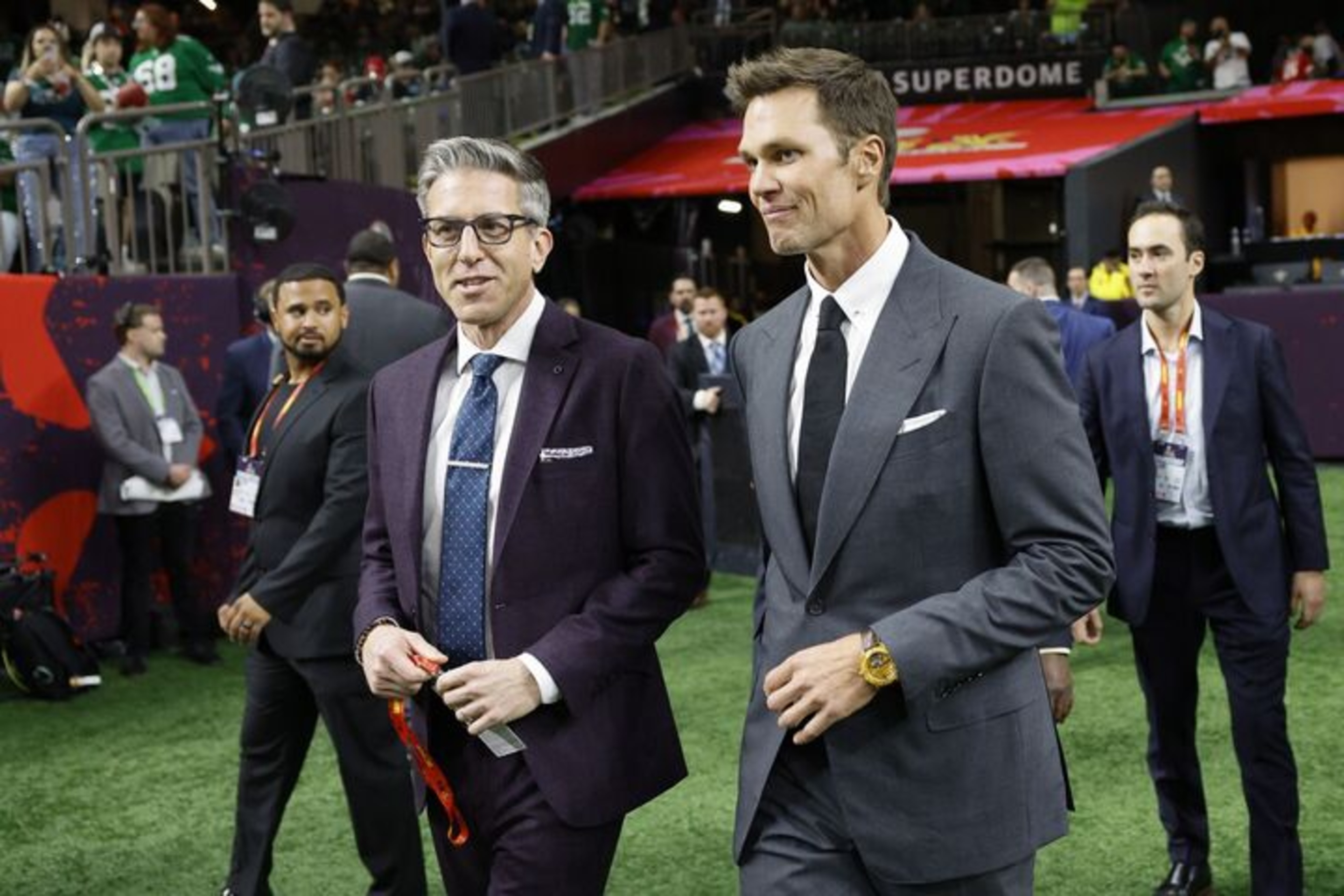 Tom Brady walking into the Super Bowl