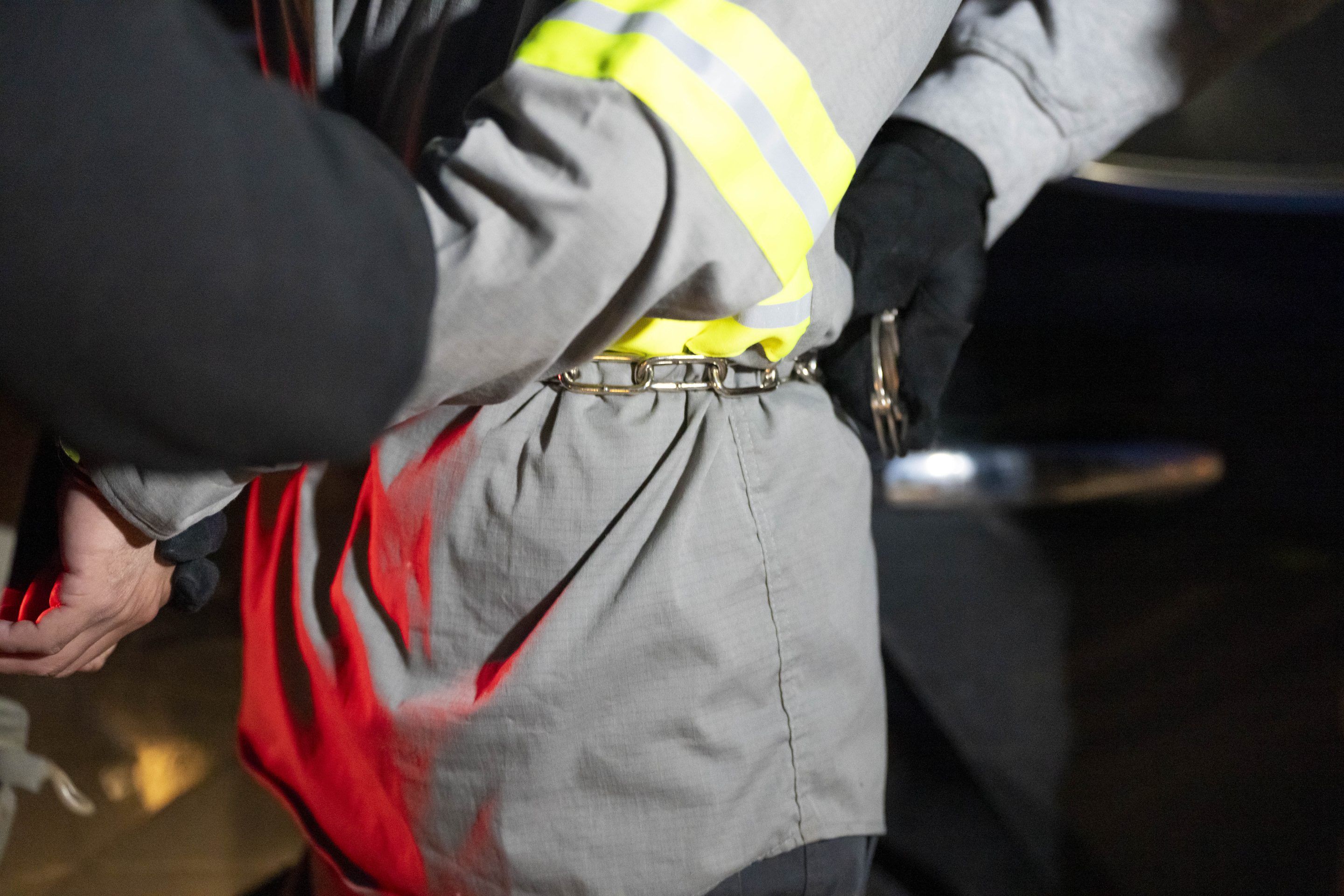 U.S. Immigration and Customs Enforcement officers detain someone during an enforcement operation, Jan. 27, 2025, in Silver Spring, Md.
