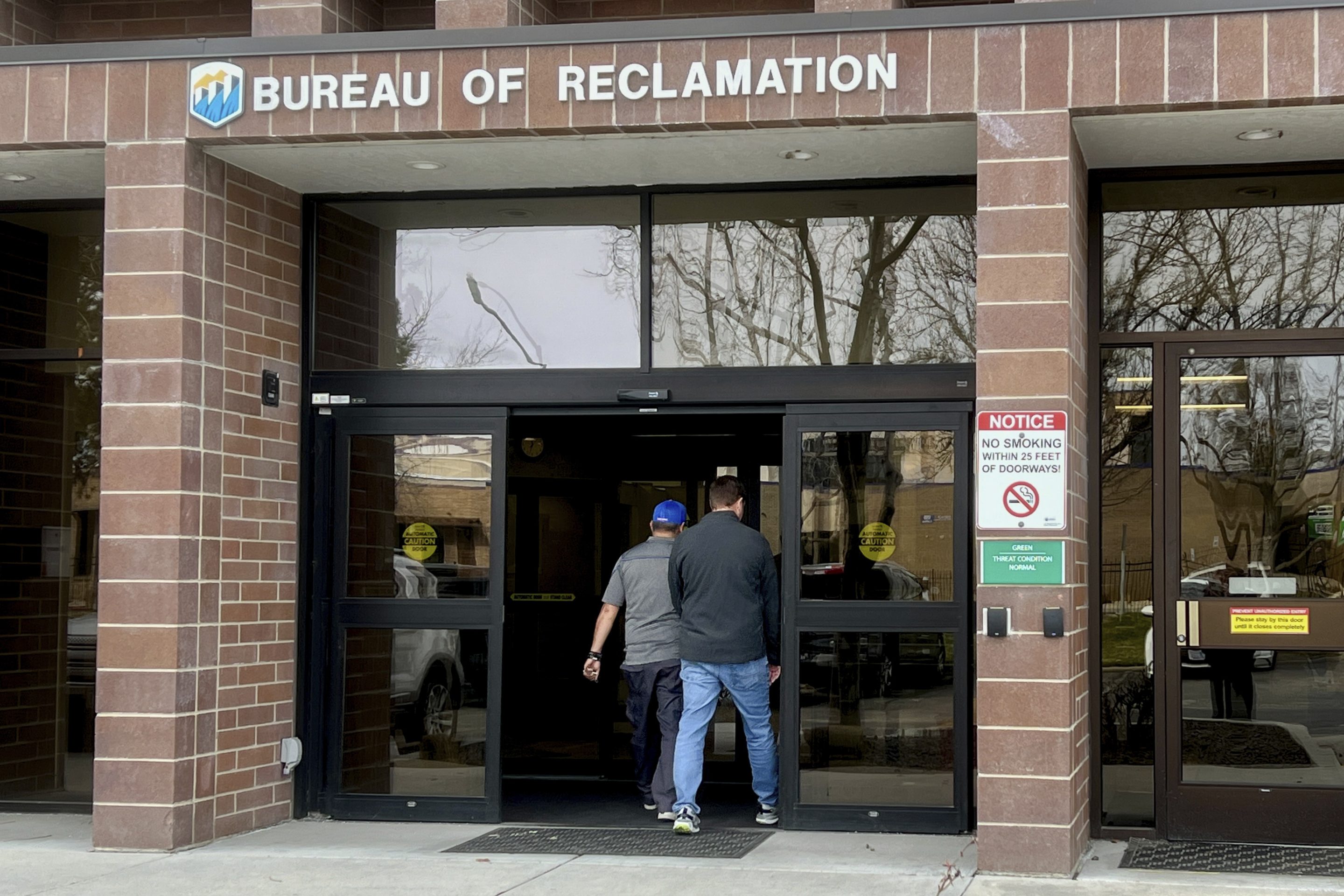 Workers enter the Bureau of Reclamation office on March 13, 2025, in Boise. 