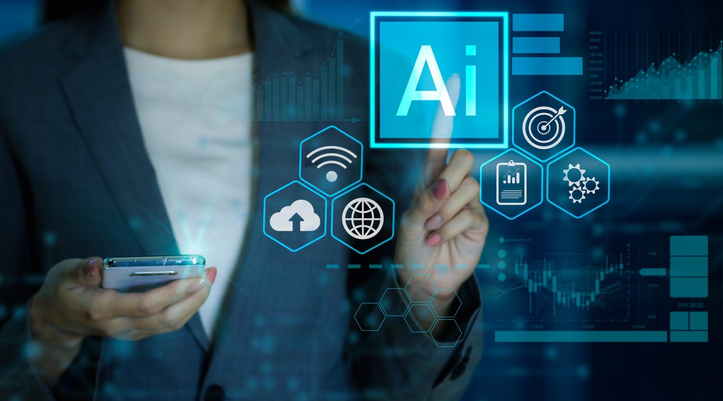 Businesswoman pressing AI button on hologram virtual screen