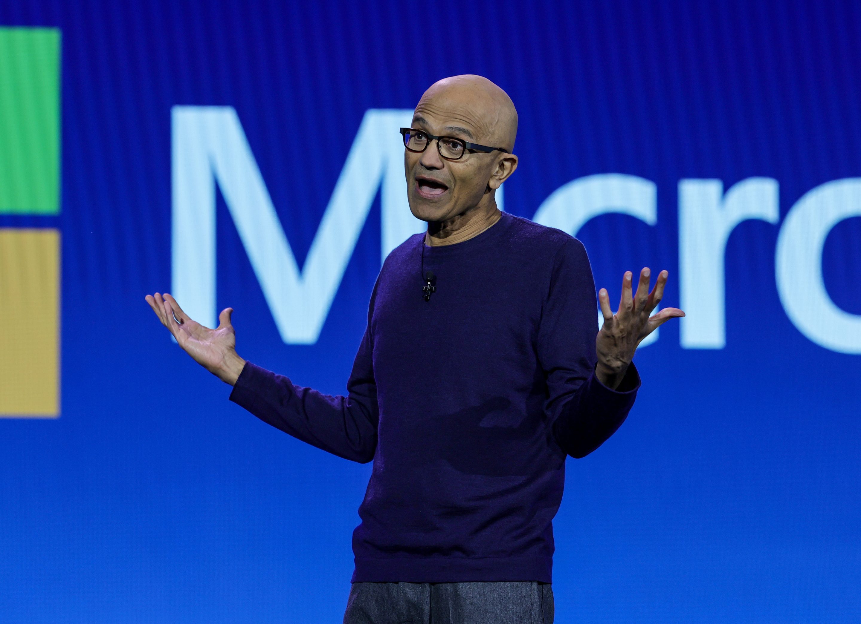 Satya Nadella, Microsoft CEO, gestures with his arms
