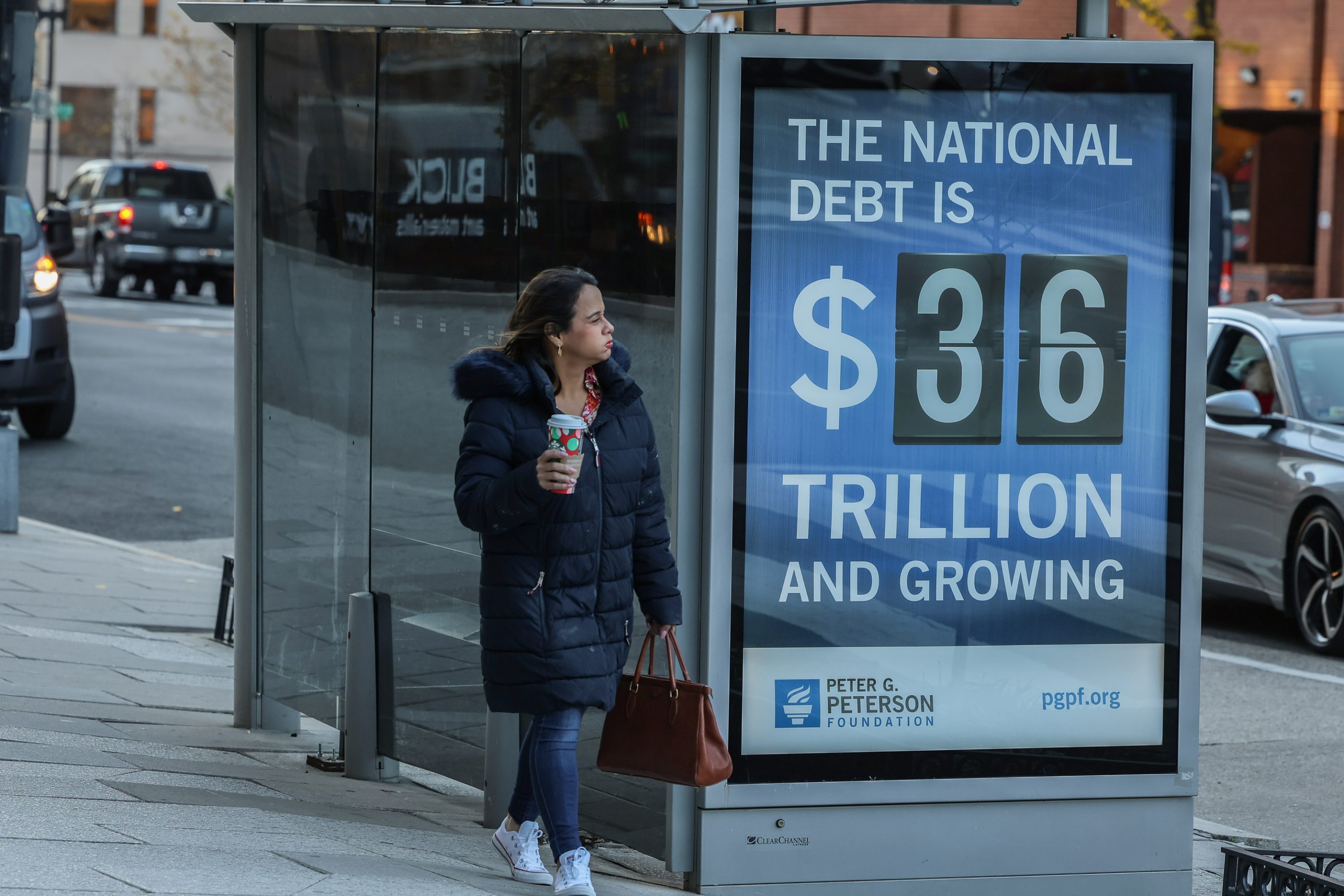 A poster displaying the U.S. national debt in Washington, DC, in December.