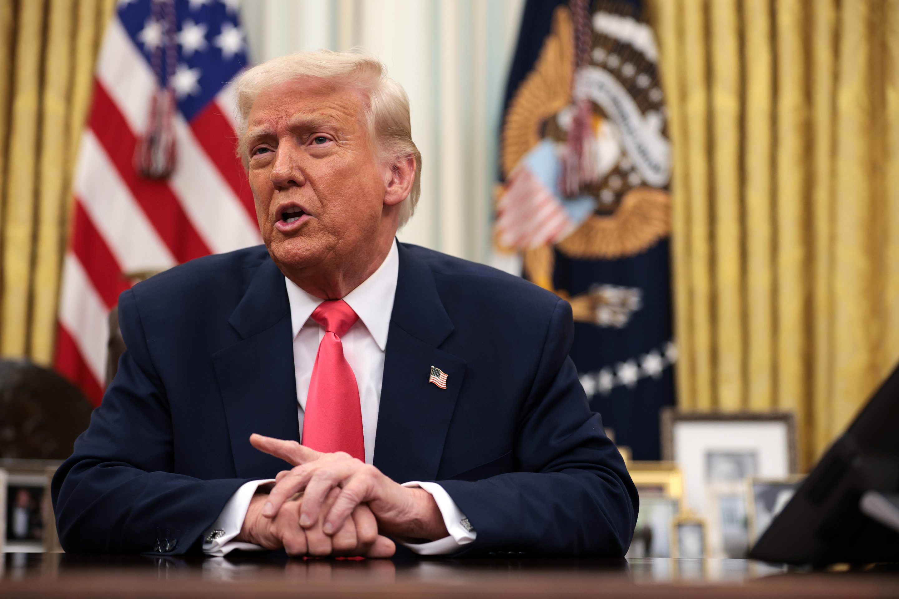 President Donald Trump signing executive orders on March 6.