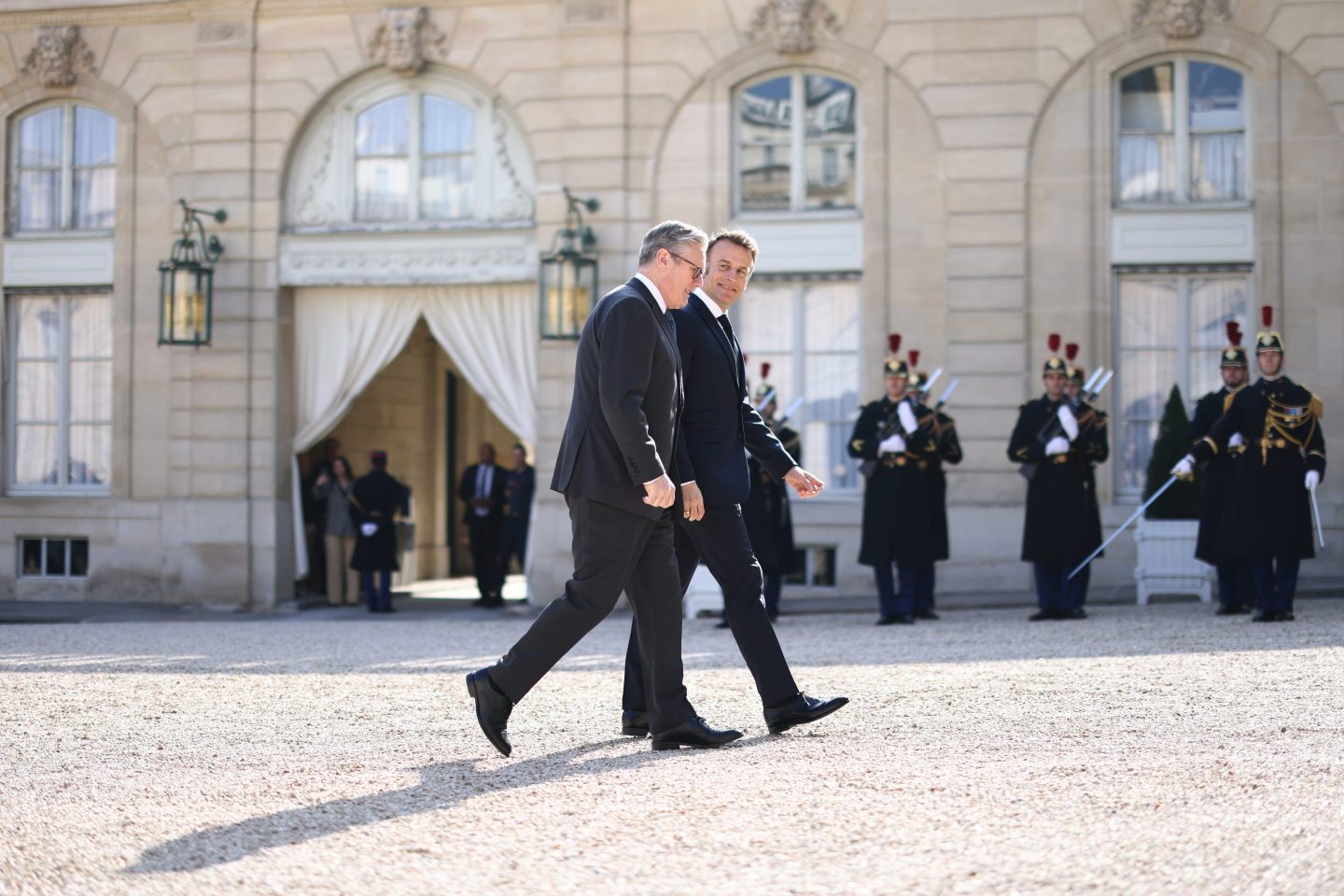 British Prime Minister Keir Starmer is greeted by French President Emmanuel Macron ahead of the 'Coalition Of The Willing' summit in support of Ukraine at Elysee Palace on March 27, 2025 in Paris, France.