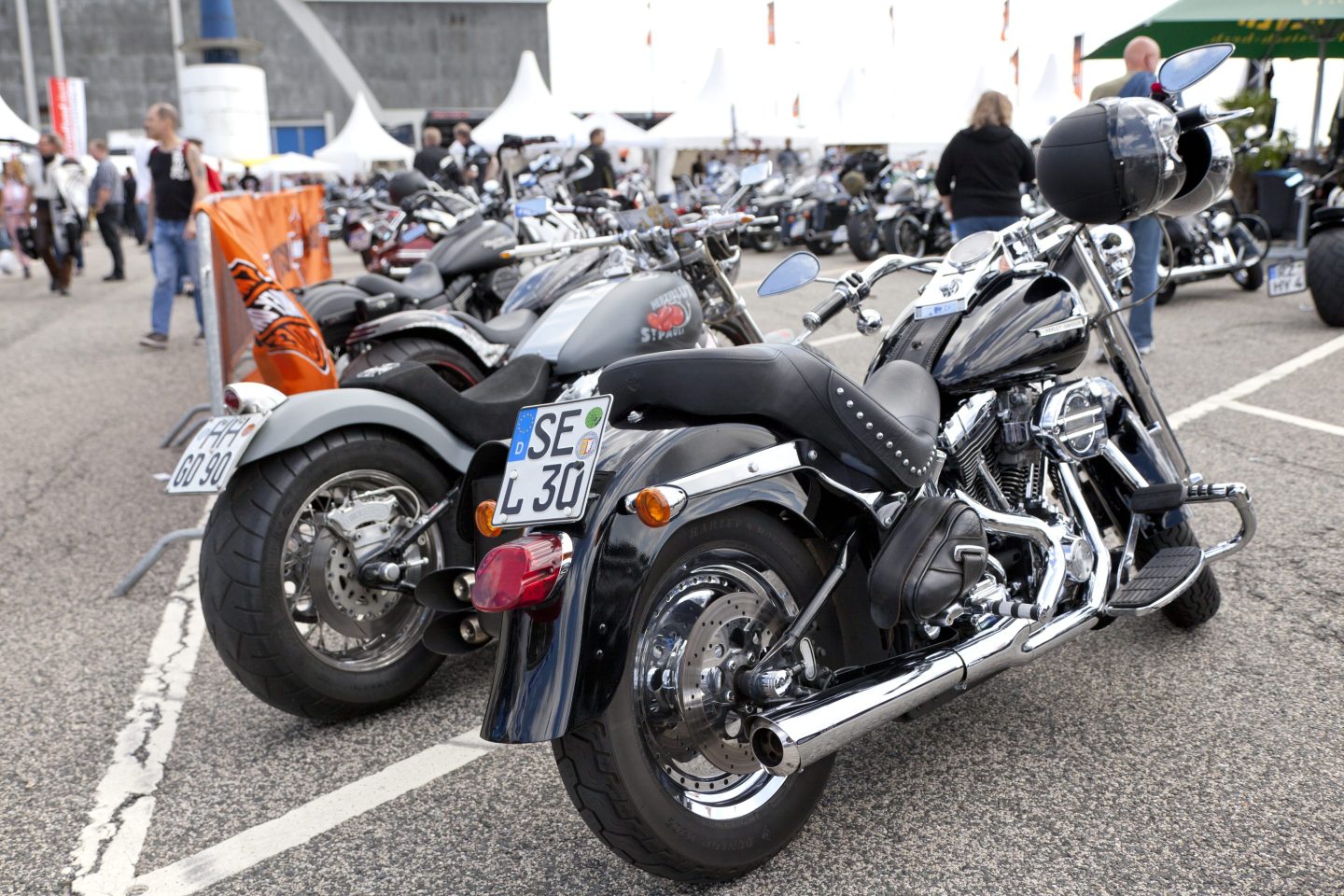 Harley Davidson event in Hamburg, Germany. It is a traditional event in Hamburg every year. Now the event is on the place Grossmarkt. Its the greatest Harley event in Germany. Lots of people are over 3 days there. The event starts with many partys and concerts. Traditional is the church service on sunday with the great rally over the streets of Hamburg with all bikers. Harley Davidson is a company for motorbikes since 1903."