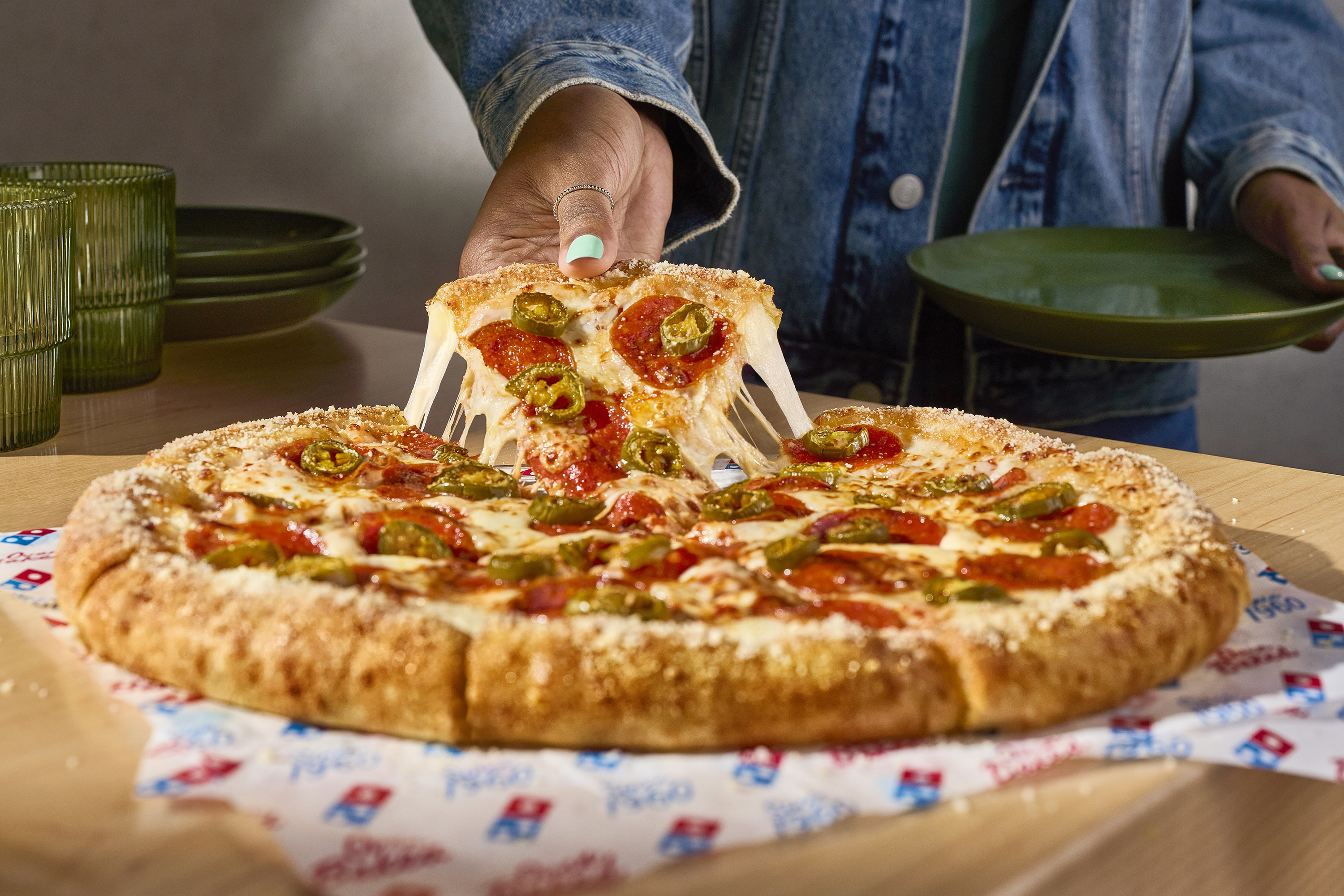 Domino's is jumping into the stuffed-crust pizza ring.