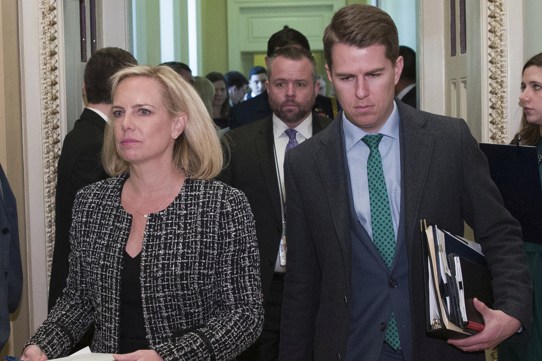 Homeland Security Secretary Kirstjen Nielsen and Department of Homeland Security chief of staff Miles Taylor, right, depart after the Republican Caucus luncheon, at the U.S. Capitol in Washington, March 5, 2019.