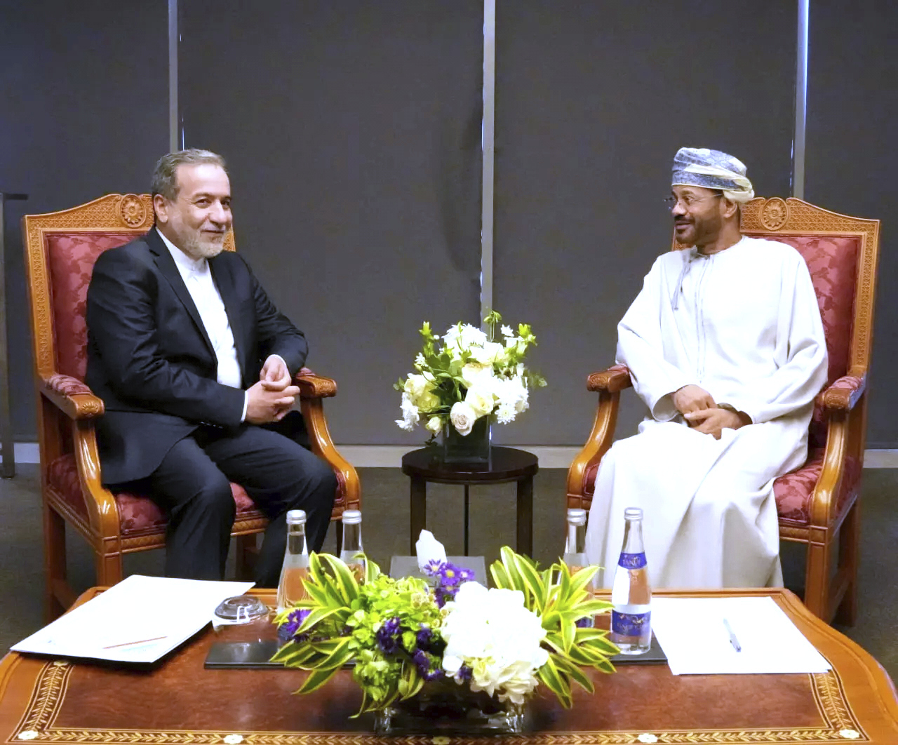Iranian Foreign Minister Abbas Araghchi, left, meets his Omani counterpart Sayyid Badr Albusaidi prior to negotiations with U.S. Mideast envoy Steve Witkoff in Muscat, Oman, Saturday.