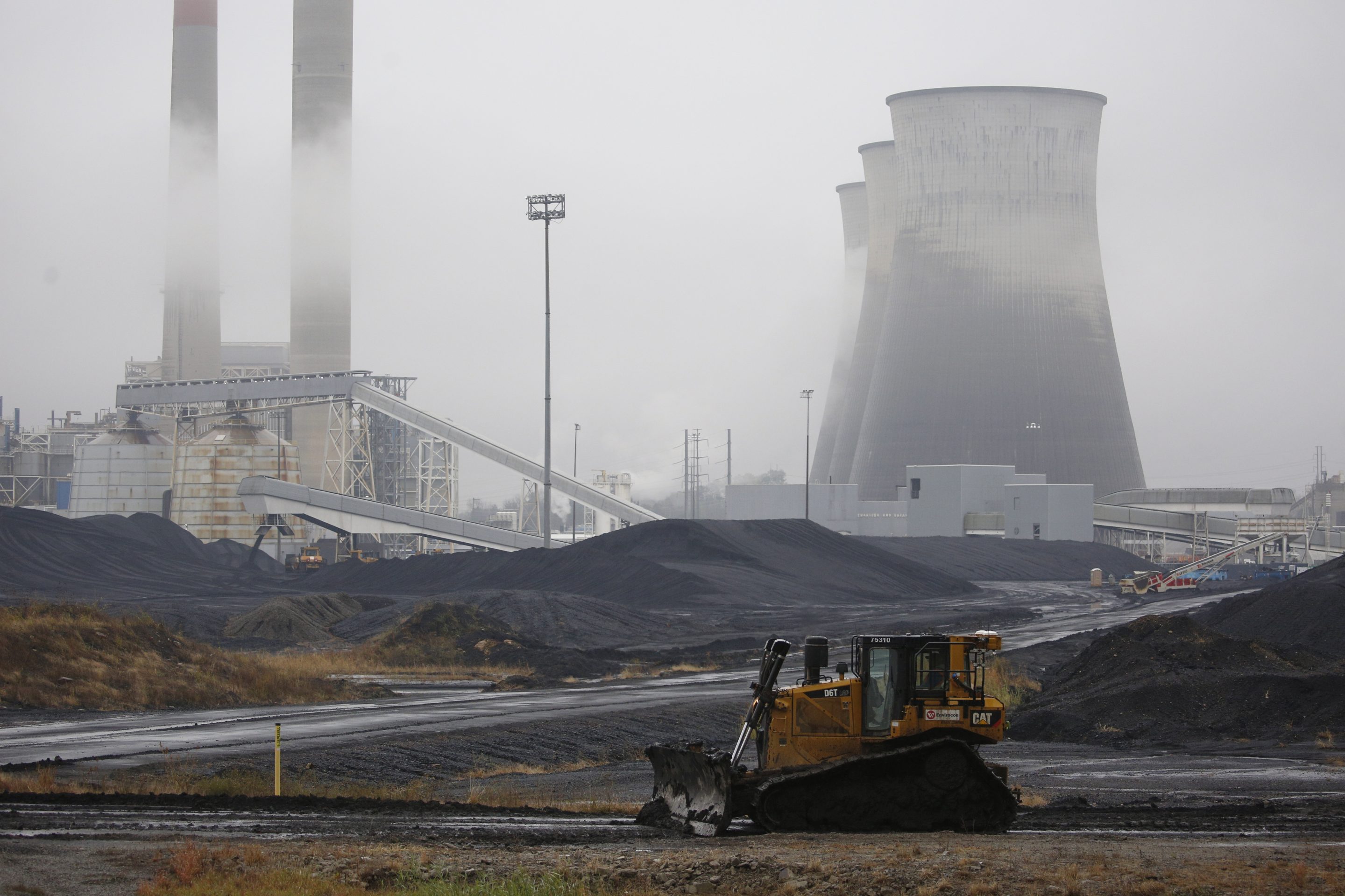 Fog surrounds a power plant