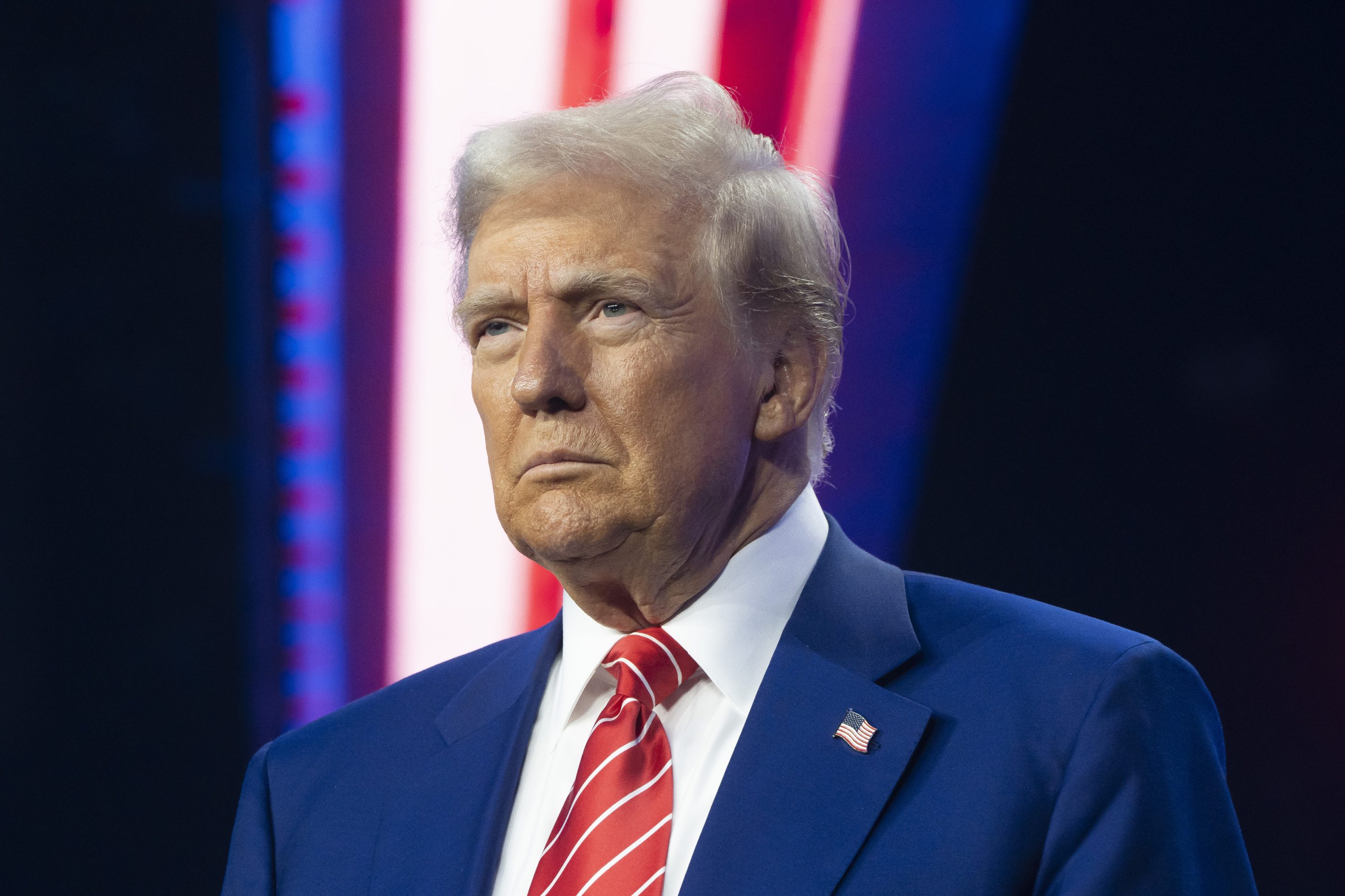 U.S. President-elect Donald Trump looks on during Turning Point USA's AmericaFest at the Phoenix Convention Center on December 22, 2024 in Phoenix, Arizona.