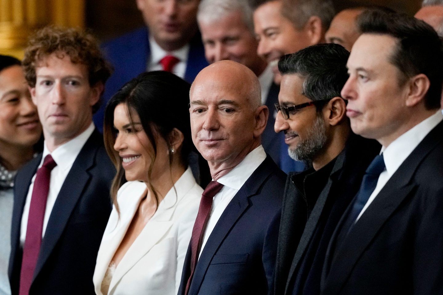 Mark Zuckerberg, Lauren Sanchez, Jeff Bezos, Sundar Pichai, and Elon Musk all in a line at the inauguration of Donald Trump.