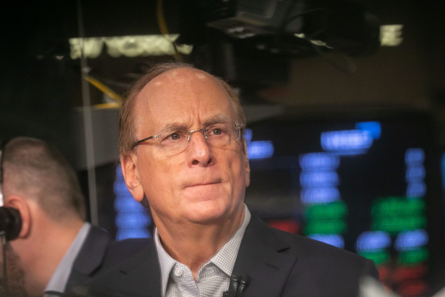 Larry Fink, chief executive officer of Blackrock Inc., during an interview on the floor at the New York Stock Exchange (NYSE) in New York, US, on Friday, April 11, 2025. US assets slumped across the board as the intensifying US-China trade spat threatens turmoil in the economy and the financial system.