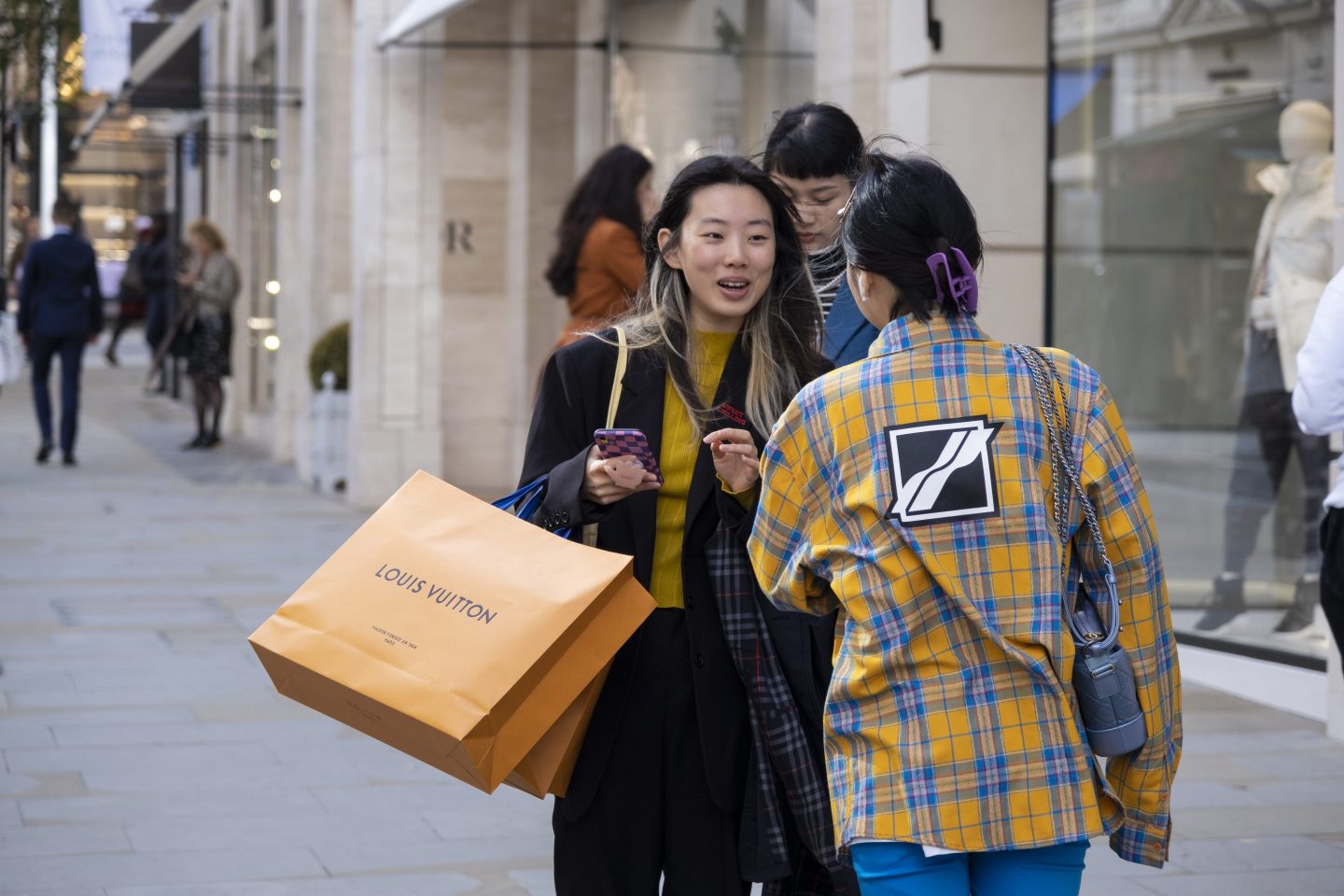 Shoppers with Louis Vuitton bags