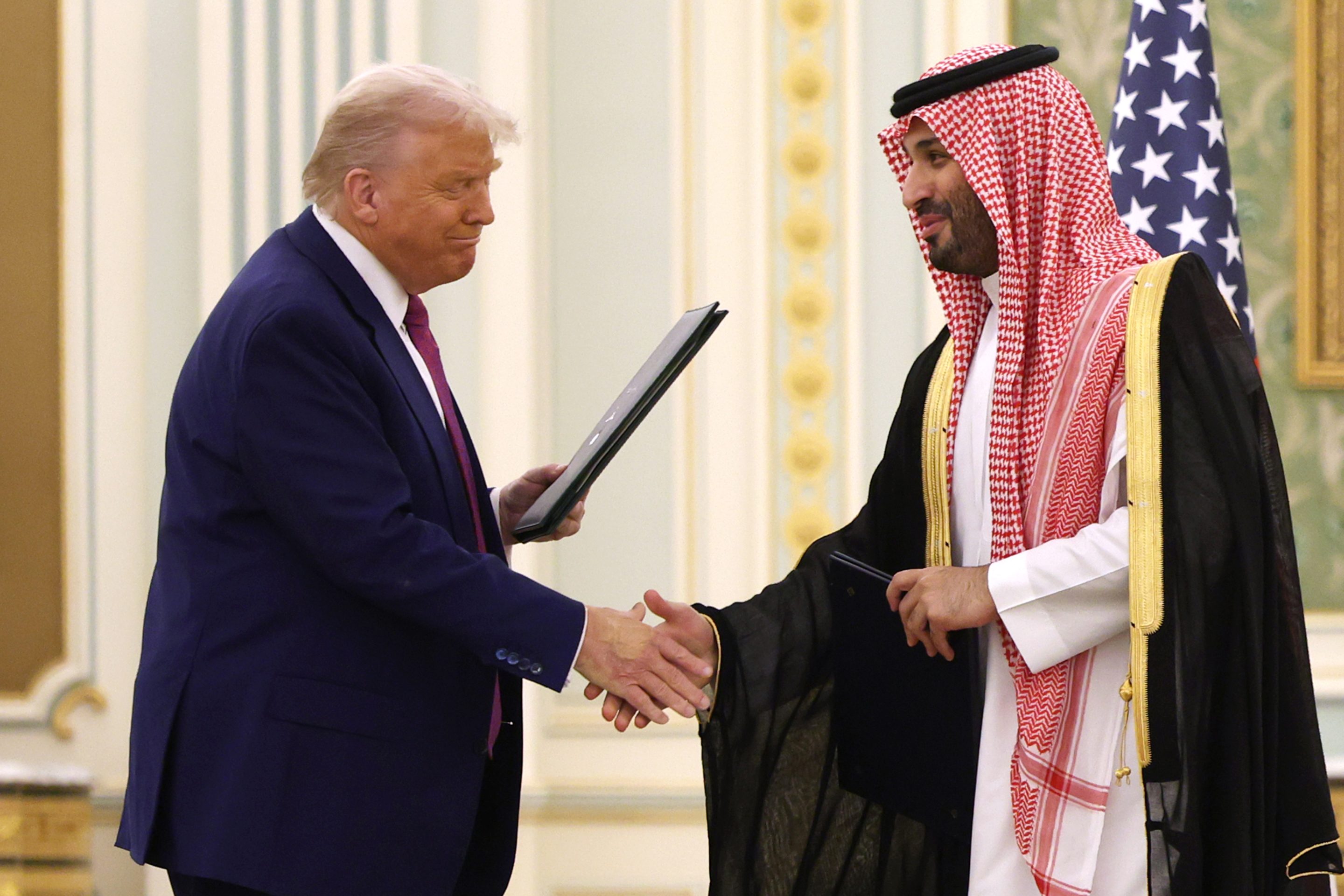 President Donald Trump and Saudi Crown Prince Mohammed bin Salman shake hands during Trump's visit to Riyadh.