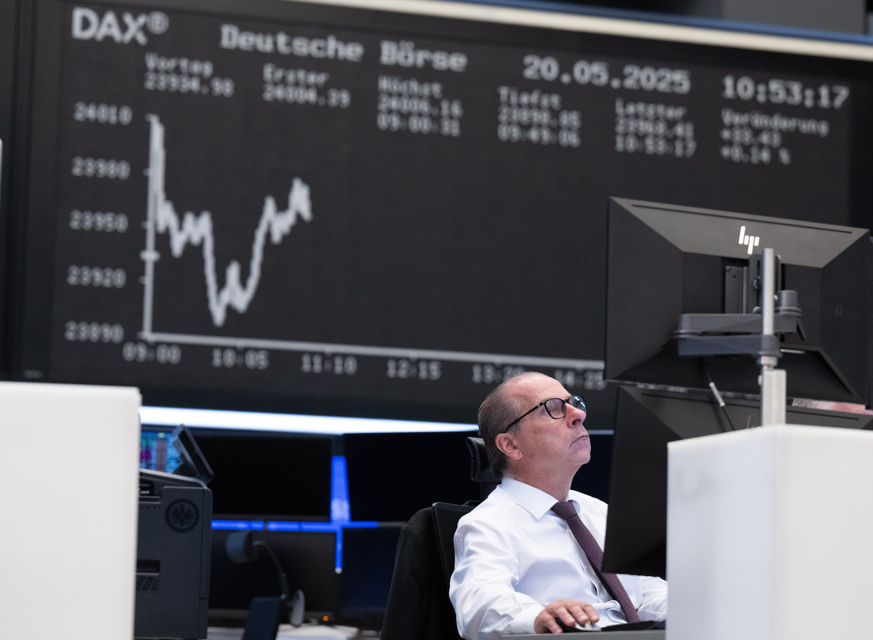 Stock traders on the trading floor in Frankfurt on May 20, 2025.