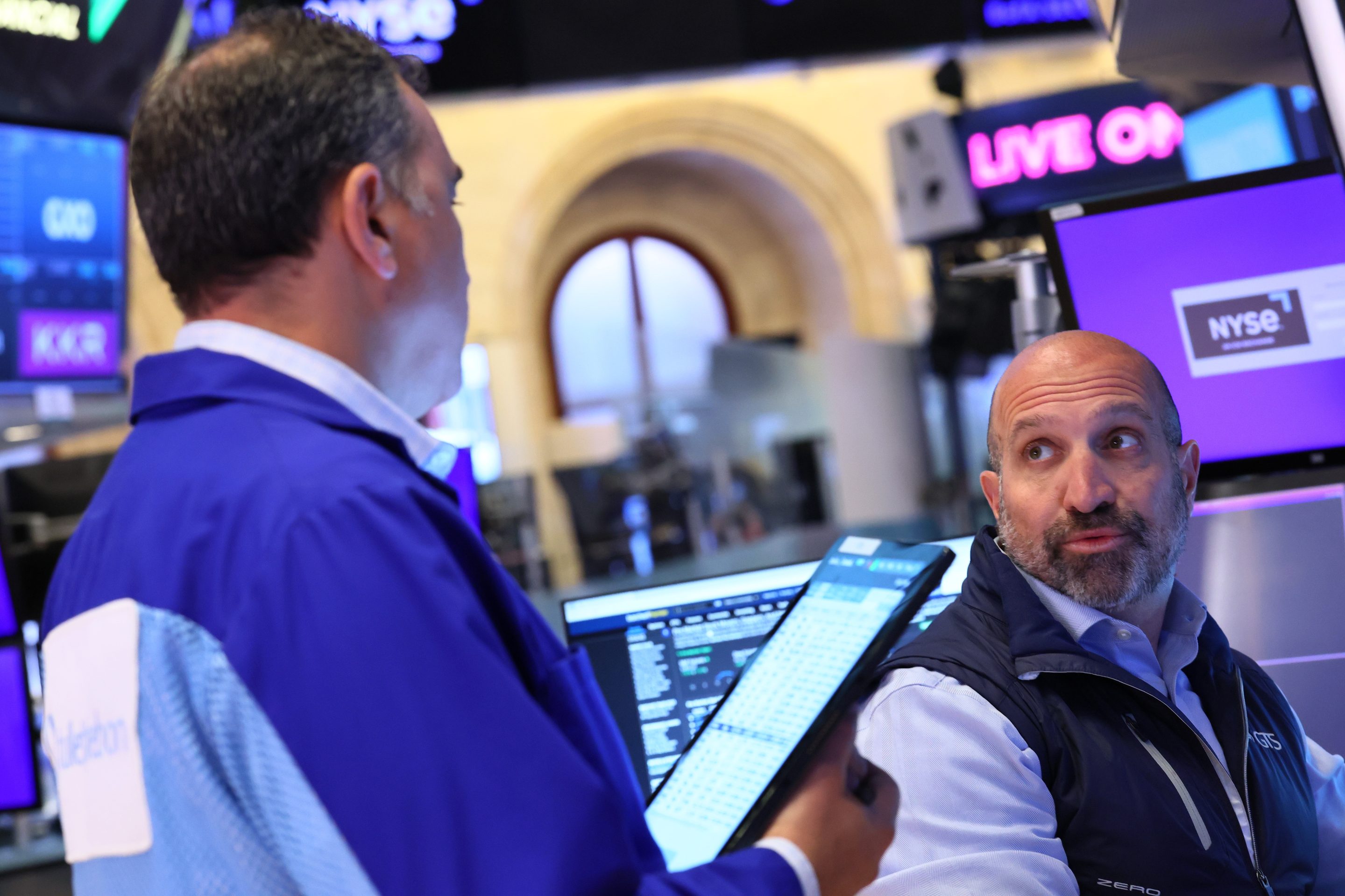 Traders work on the floor of the New York Stock Exchange on May 27, 2025.