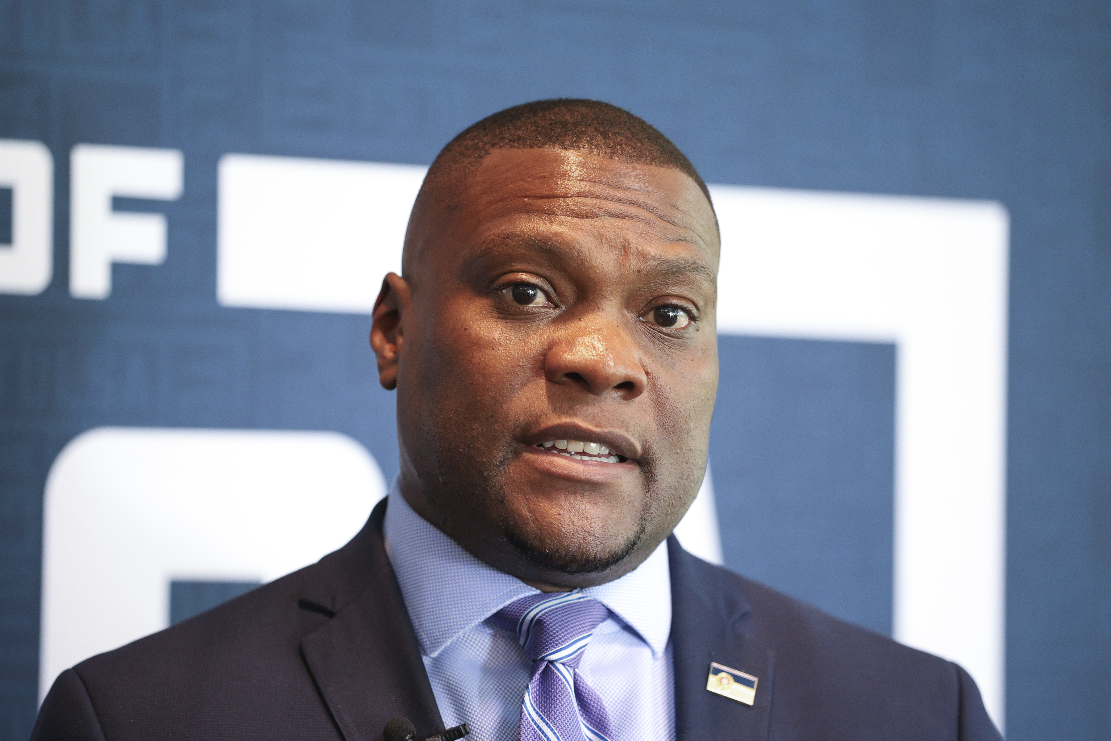 Tulsa's new mayor on Sunday proposed a $100 million private trust as part of a reparations plan to give descendants of the 1921 Tulsa Race Massacre scholarships and housing help in a city-backed bid to make amends for one of the worst racial attacks in U.S. history.